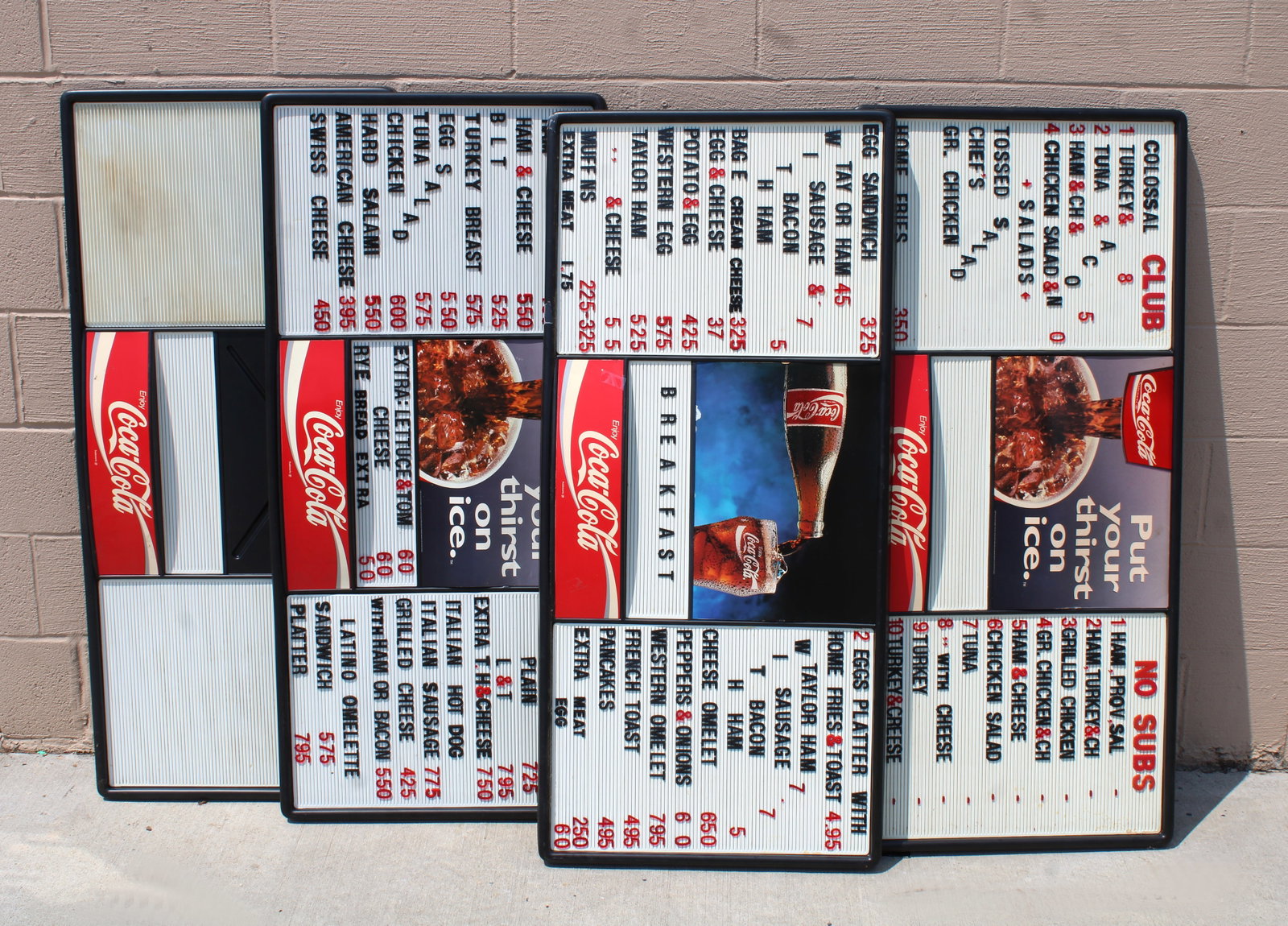 Coca Cola Menu Boards, Total of 4: This item requires third party shipping or pickup arrangements to be made. Dimensions of one: 23 x 50 x 2