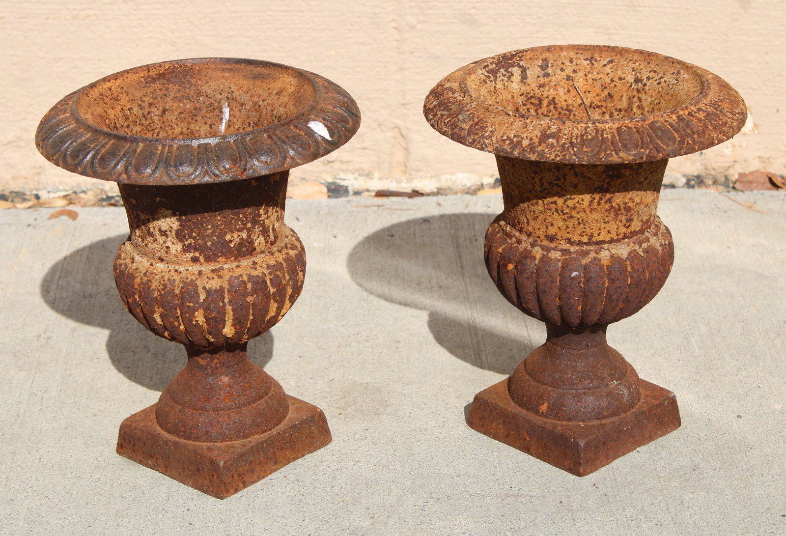 Cast Iron Urns: In-house shipping available. Dimensions of One: 9 x 8 x 8