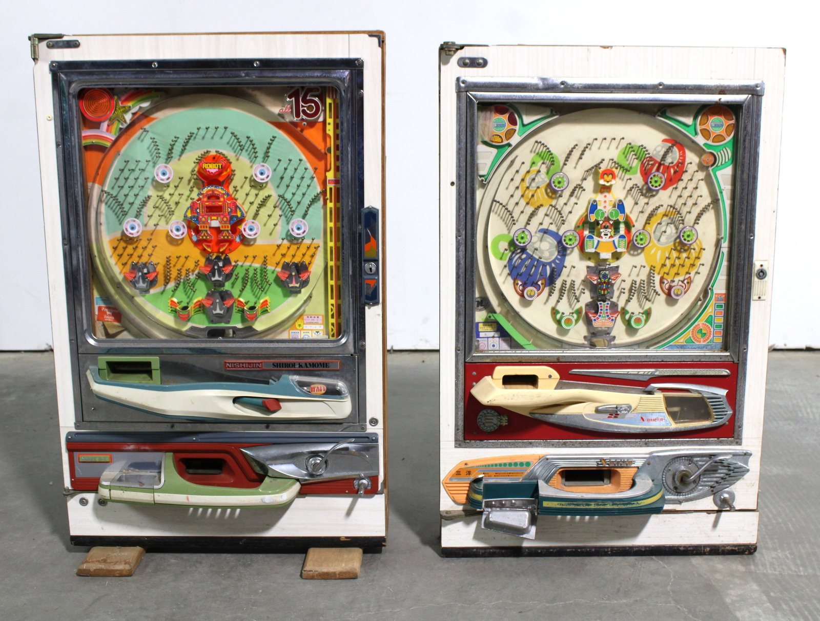 Pair of Pachinko Machines: Untested. This item requires third-party shipping or pickup arrangements to be made. Dimensions of one: 32 x 21 x 10