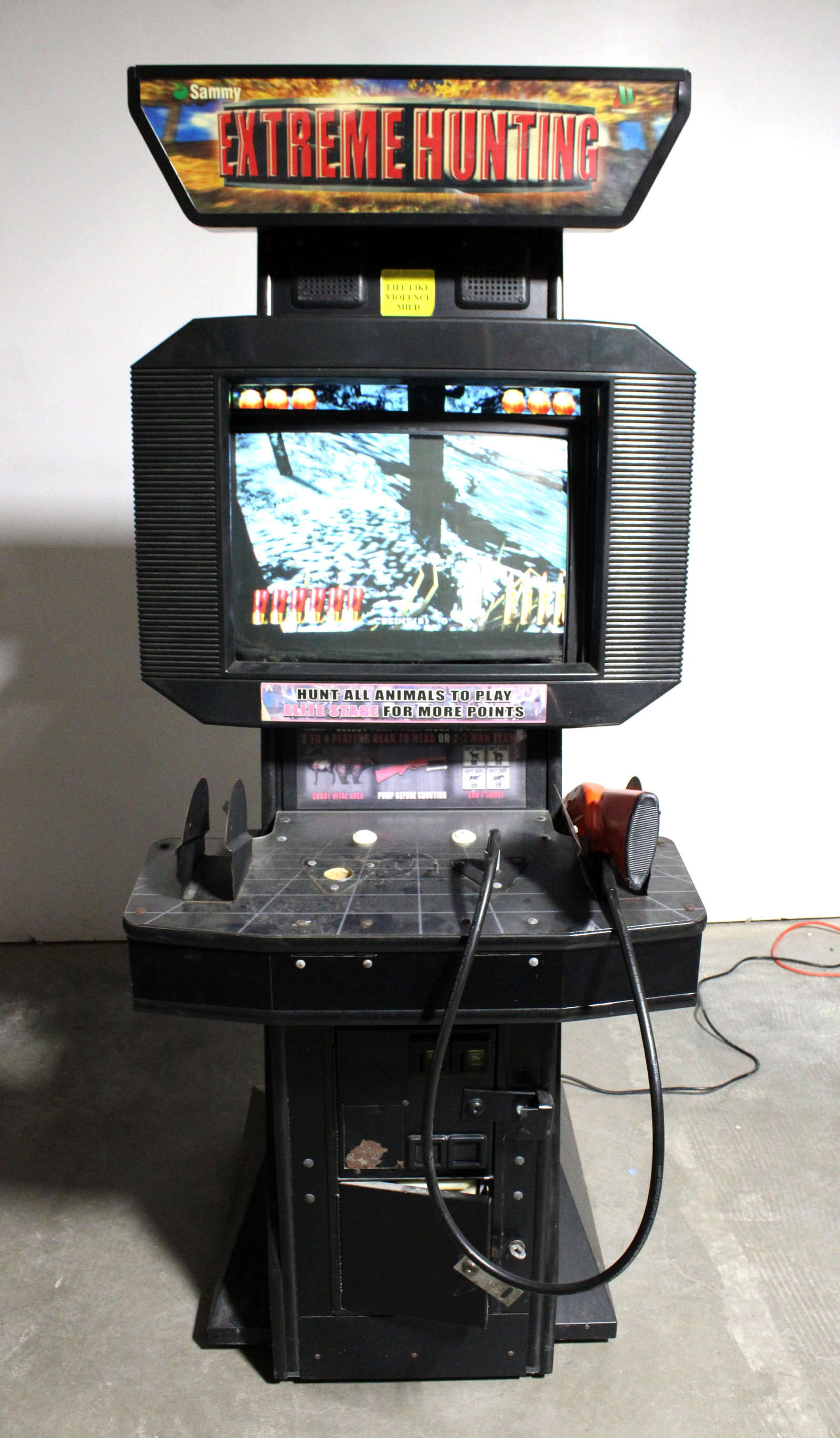 Sammy Extreme Hunting Arcade Game in Sammy Atomiswave Cabinet: Working but no gun for player 1. This item requires third-party shipping or pickup arrangements to be made. Dimensions: 76 x 32 x 40