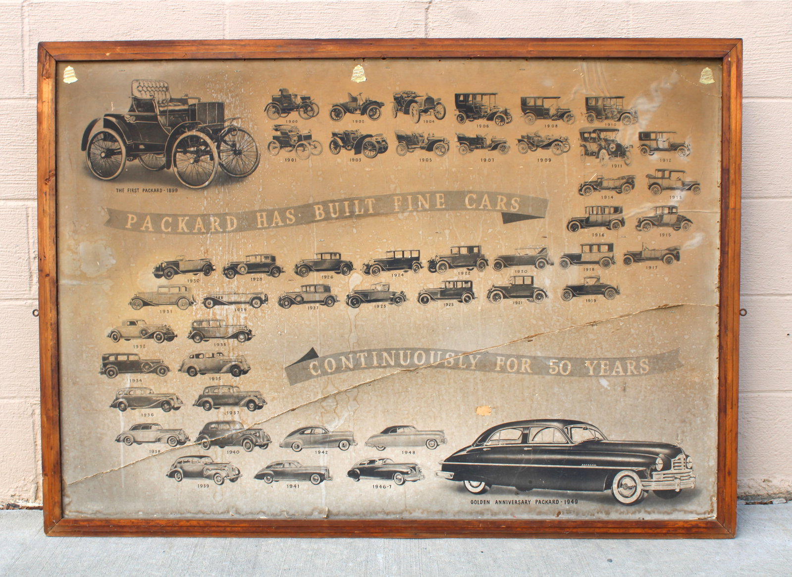 Packard Dealership Sign, Golden Anniversary 1949: This item requires third-party shipping or pickup arrangements to be made. Dimensions in frame: 37 x 54 x 1