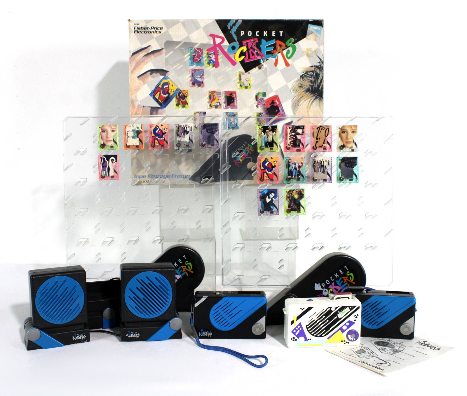 Pocket Rocker Tape Players, Speakers, Displays and Tapes: 1980s. Rare extension speakers (working with batteries). White player is working (with batteries), blue player needs adjustment. In-house shipping available.