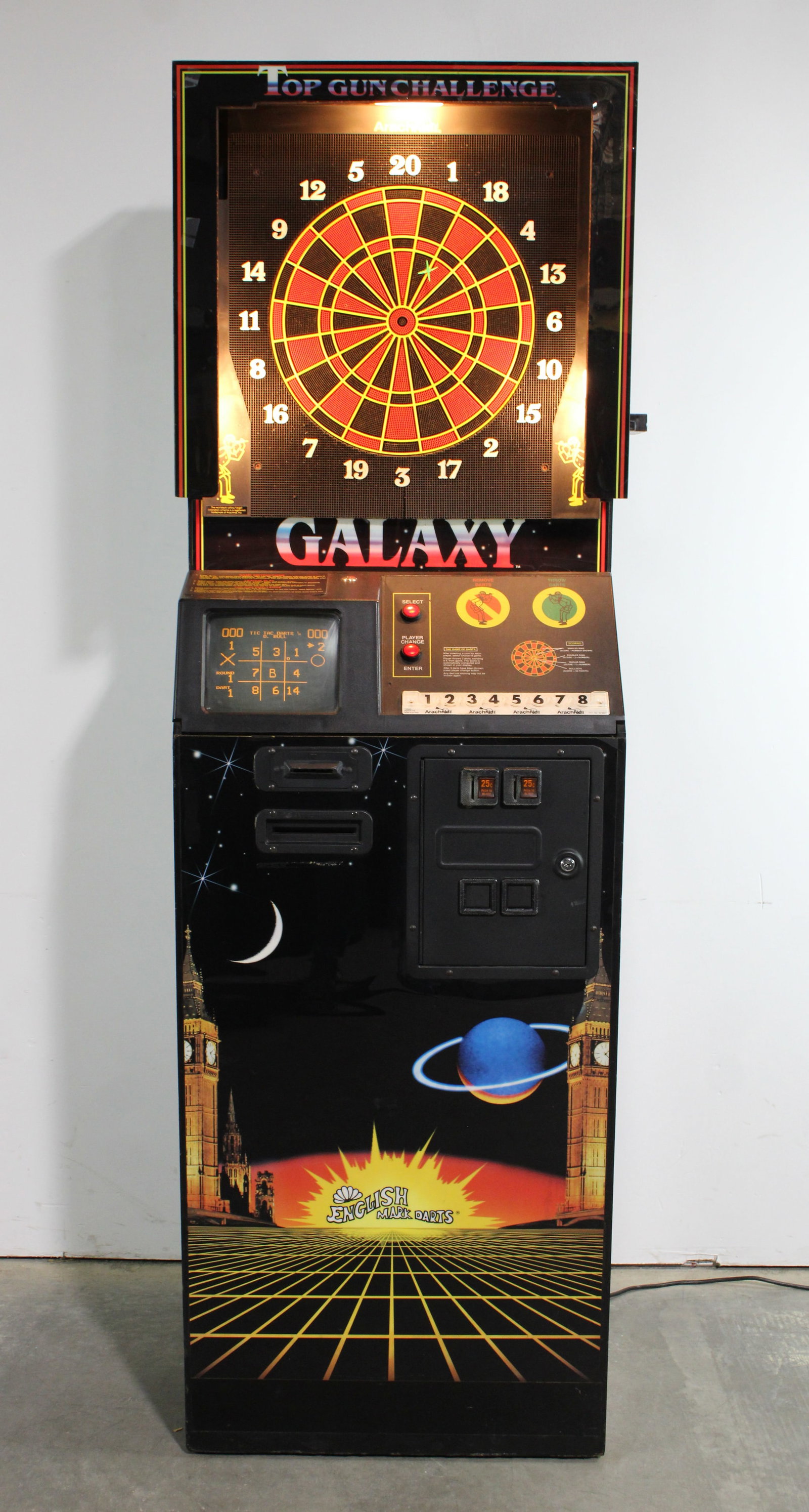 Galaxy Top Gun Challenge Darts Arcade Game: Working, with darts. This item requires third-party shipping or pickup arrangements to be made. Dimensions: 82 x 26 x 12