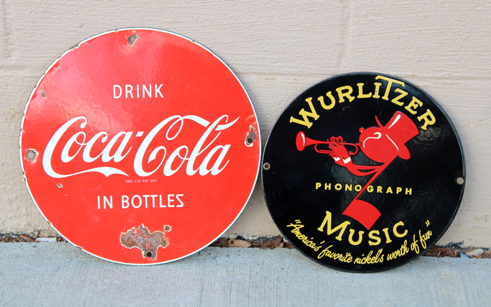 Wurlitzer / Coca Cola Porcelain Novelty Signs: Total of 2. Contemporary. In-house shipping available. Dimensions of one: 12 x 12