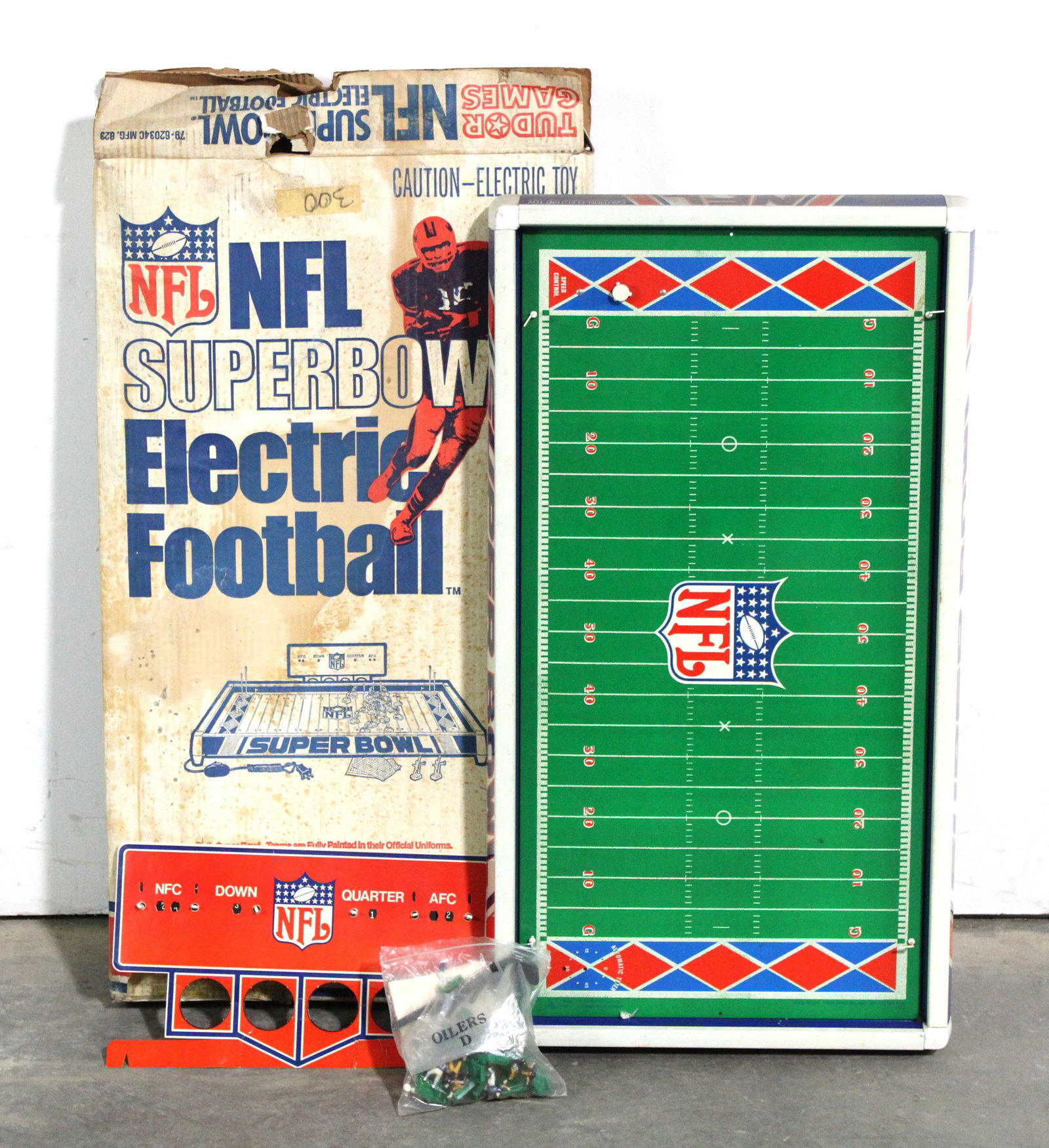 Tudor Games NFL SuperBowl Electric Toy: This item requires third-party shipping or pickup arrangements to be made. Dimensons of box: 33 x 18 x 4