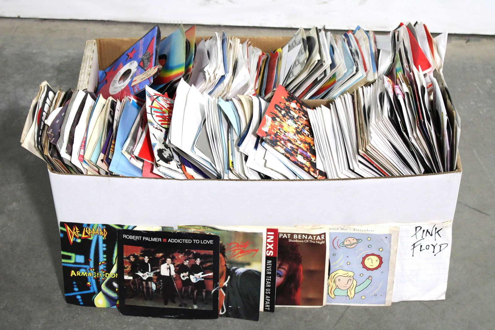 Large Lot of 45rpms Records for Jukebox, Lot 3: Stacked two high. Not checked for condition. In-house shipping available.