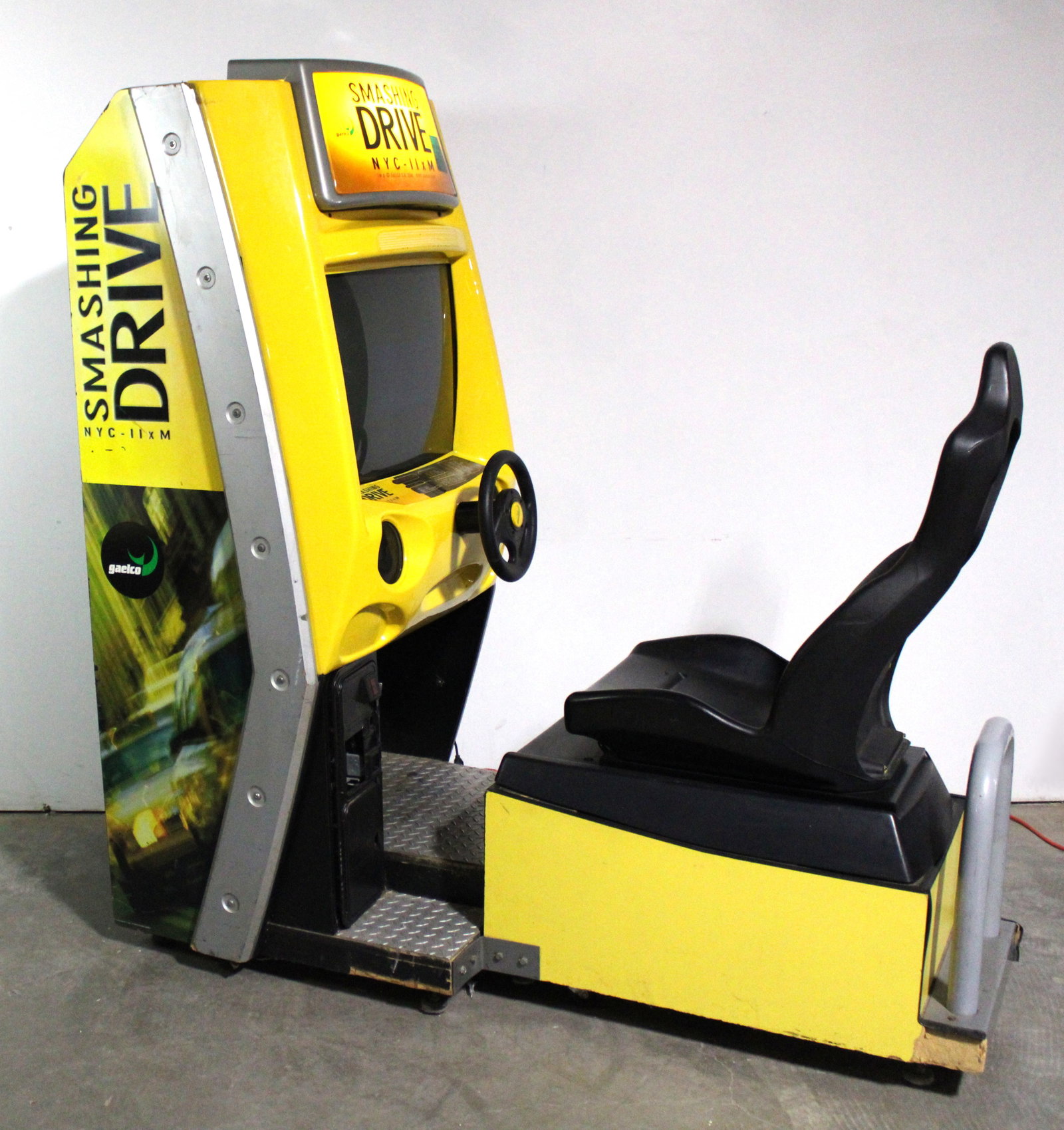 Gaelco Smashing Drive Sit Down Racing Arcade Game: Complete. Powers on, no signal. This item requires third-party shipping or pickup arrangements to be made. Dimensions: 73 x 36 x 72