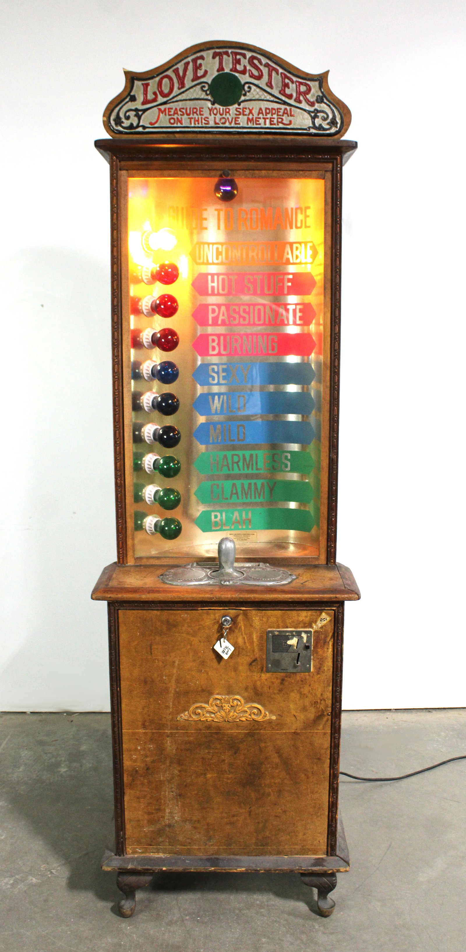 Exhibit Supply Coin Operated Love Tester: Working. Includes original coin chute. This item requires third-party shipping or pickup arrangements to be made. Dimensions: 85 x 25 x 19