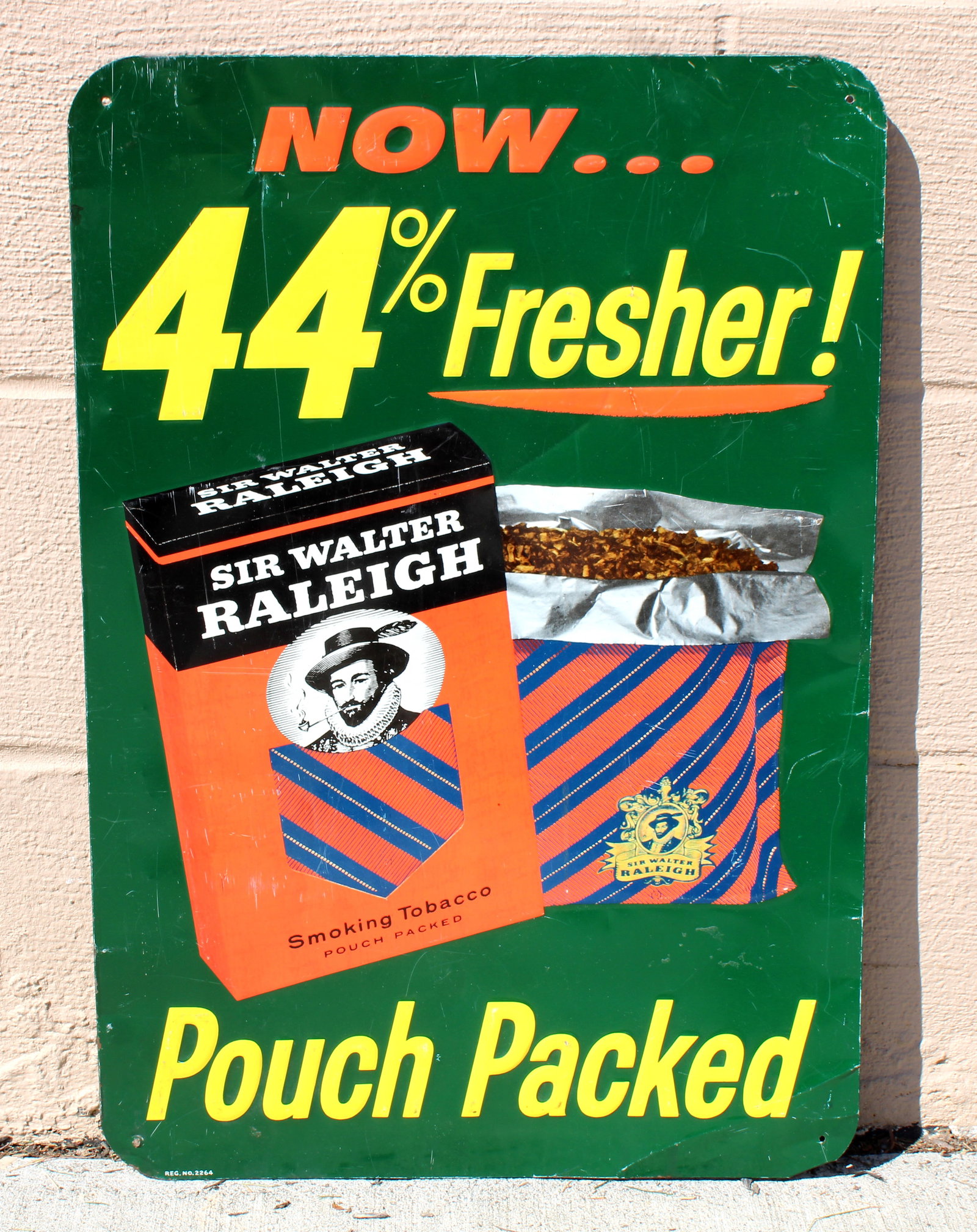 Raleigh Tobacco Embossed Tin Sign: Dimensions: This item requires third-party shipping or pickup arrangements to be made. Dimensions: 24 x 17