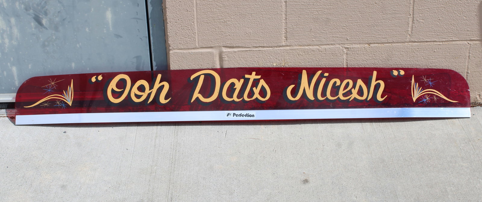 "Ooh Dats Nicesh" Truck Bug Deflector: Greaseman DC 101 themed. This item requires third-party shipping or pickup arrangements to be made. Dimensions: 7 x 60 x 1
