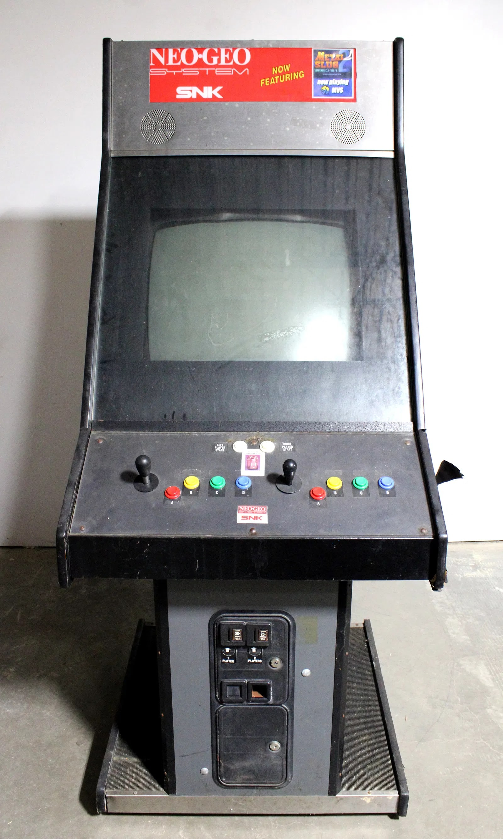 Neo Geo Metal Slug Arcade Game: Not working. Has cartridge. This item requires third-party shipping or pickup arrangements to be made. Dimensions: 79 x 32 x 42