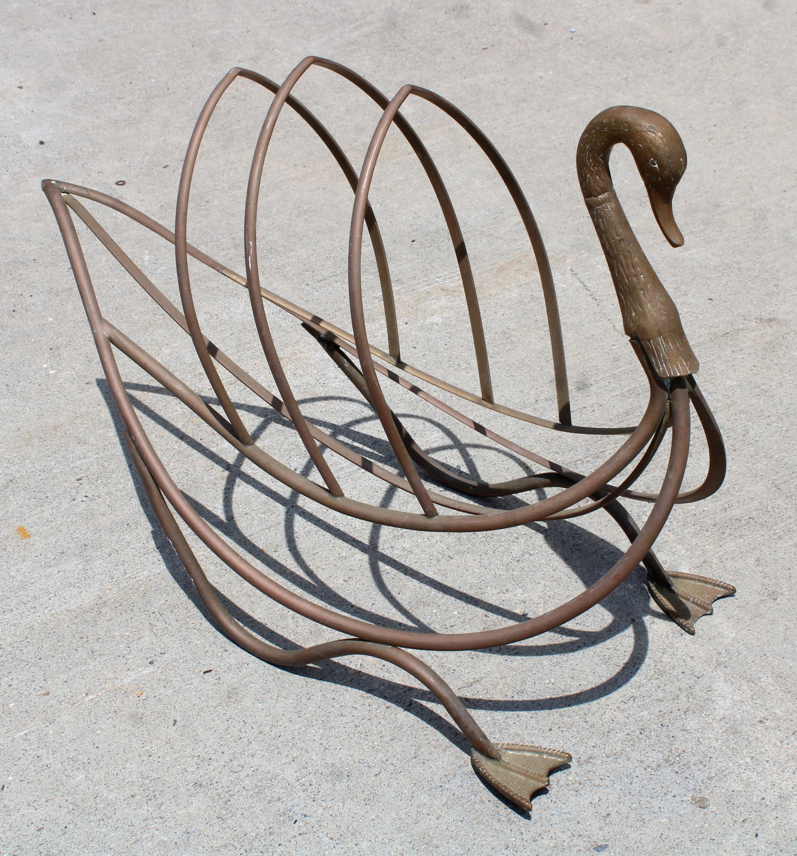 Vintage Brass Duck / Swan Magazine Holder: This item requires third-party shipping or pickup arrangements to be made. Dimensions: 19 x 13 x 25