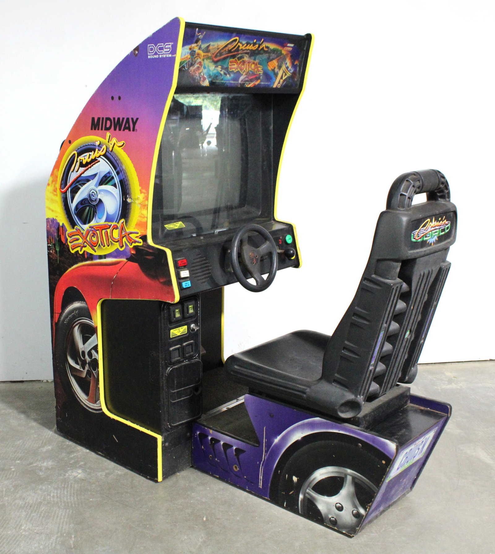 Cruis'n Exotica Sit Down Racing Arcade Game: Plays blind. No monitor chasis. This item requires third-party shipping or pickup arrangements to be made. Dimensions: 68 x 31 x 63