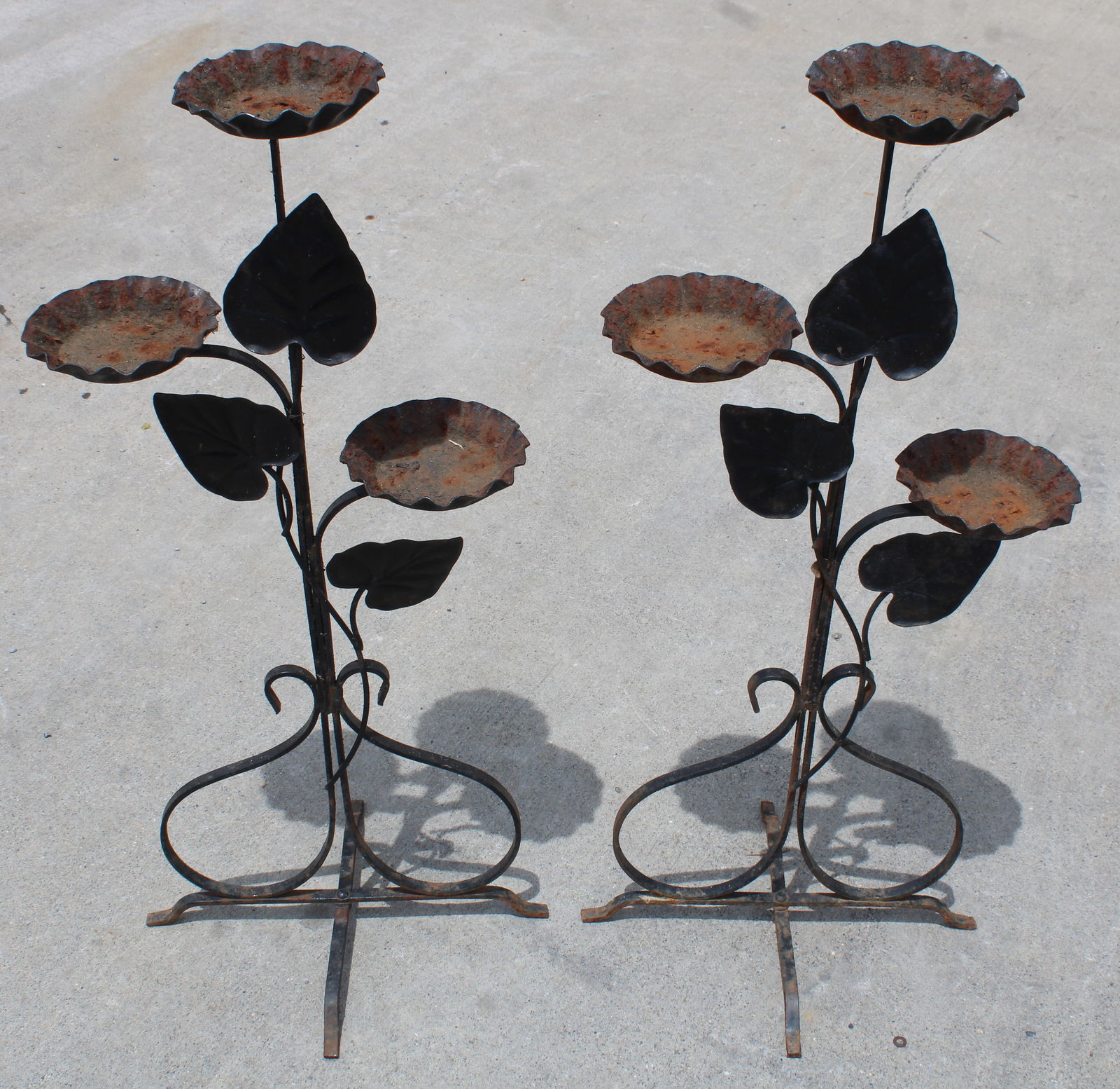 Pair of Vintage Wrought Iron Plant Stands: This item requires third-party shipping or pickup arrangements to be made. Dimensions of one: 33 x 16 x 13