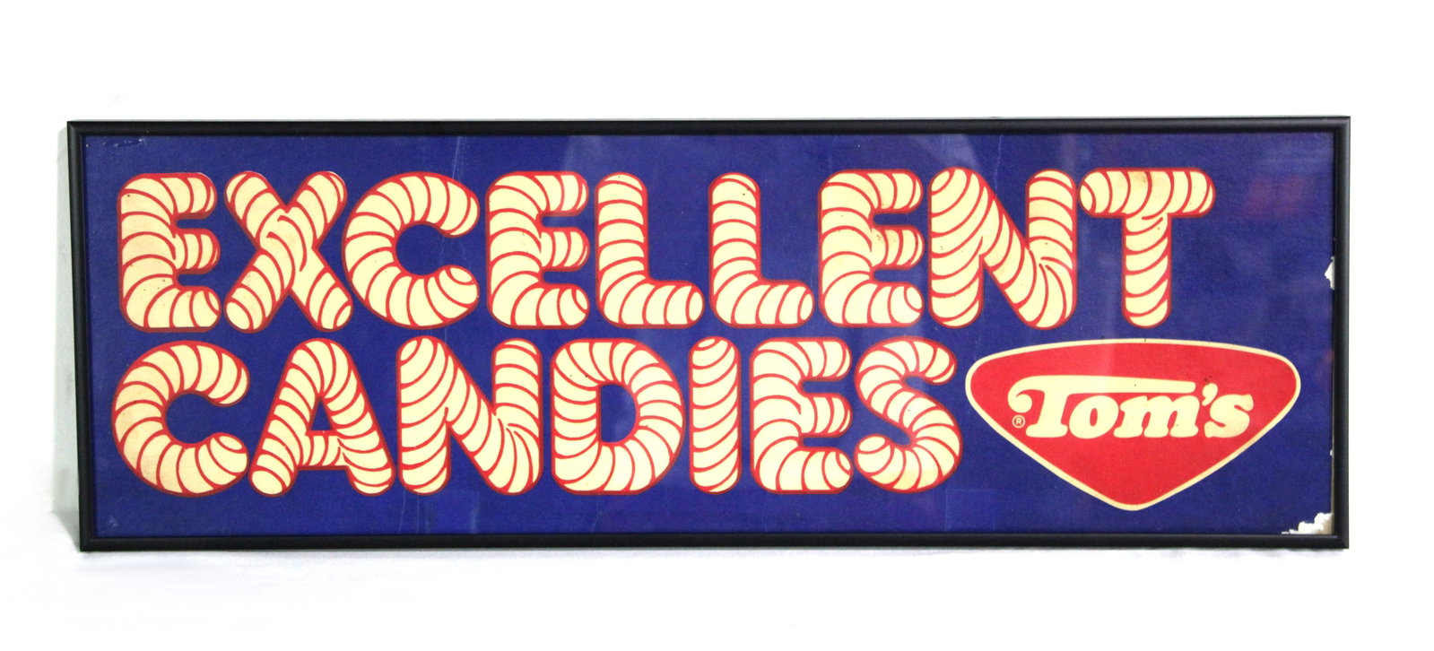 Tom's Excellent Candies Framed Advertisement: This item requires third-party shipping or pickup arrangements to be made. Dimensions: 8 x 24 x 1