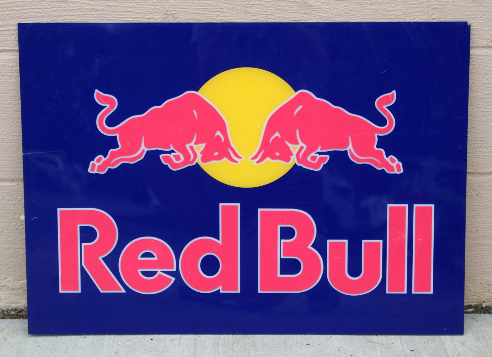 Red Bull Sign: Plastic. In-house shipping available. Dimensions: 19 x 27