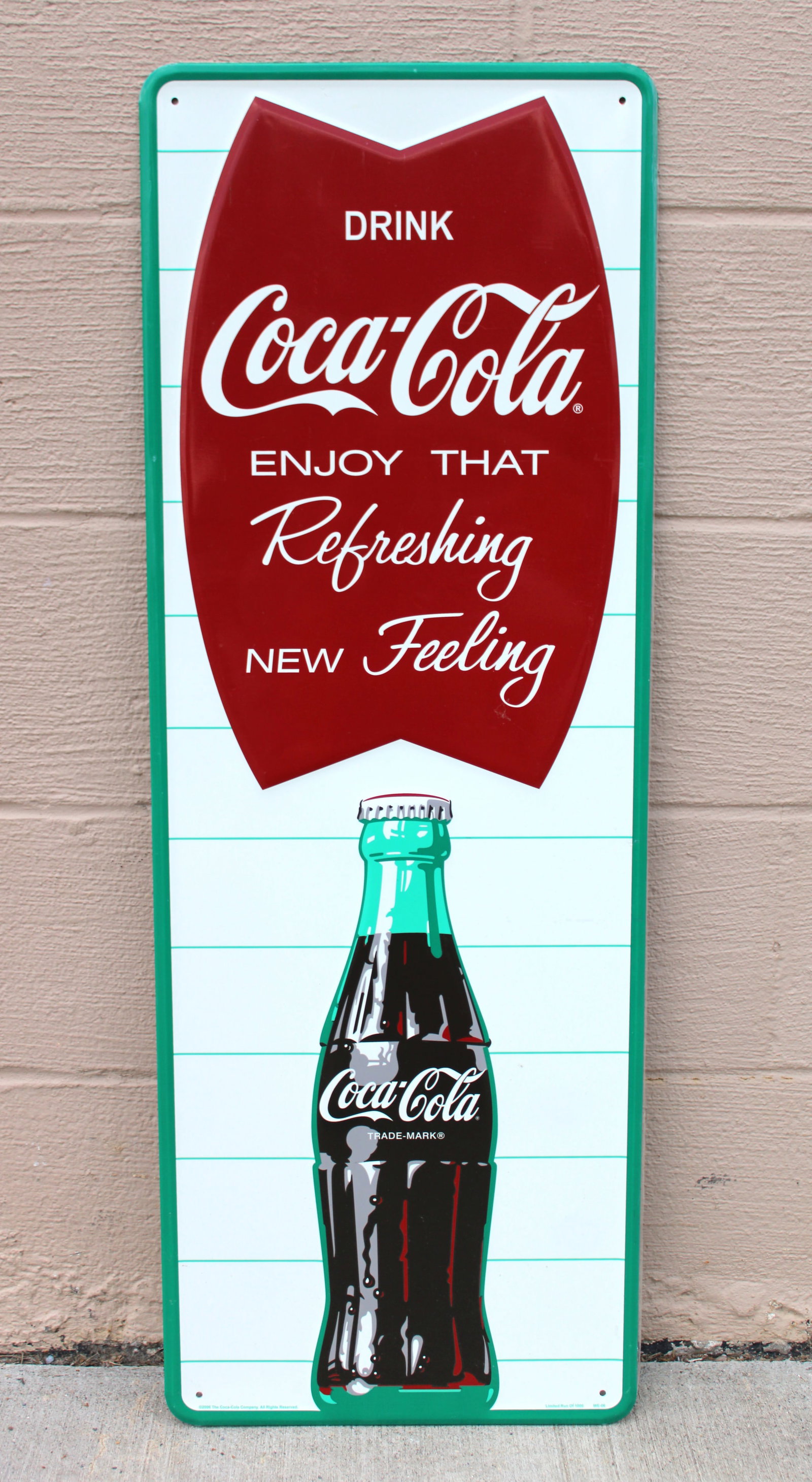 Coca Cola Fishtail Sign, 2006 Limited Run: Has protective cover. This item requires third-party shipping or pickup arrangements to be made. Dimensions: 38 x 14