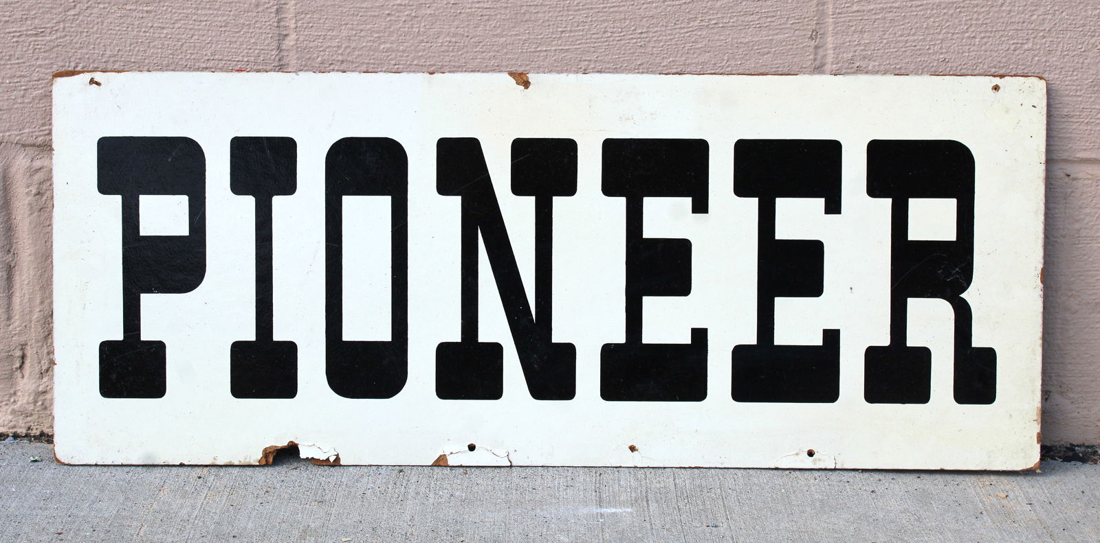 Pioneer Feeds Masonite Sign (1 of 2)