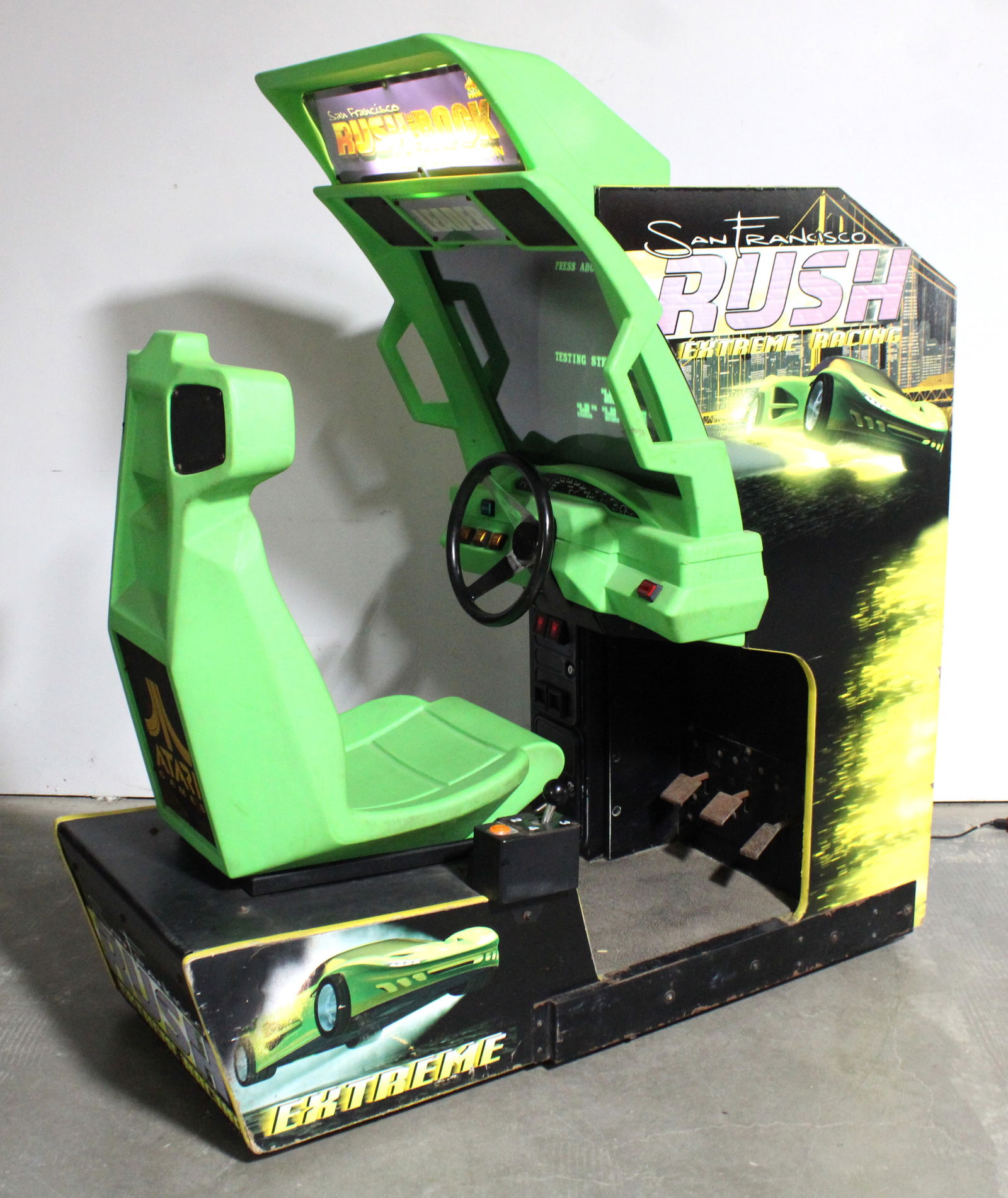 Atari San Francisco Rush the Rock Sit Down Racing Arcade Game: Working. This item requires third-party shipping or pickup arrangements to be made. Dimensions: 68 x 32 x 62