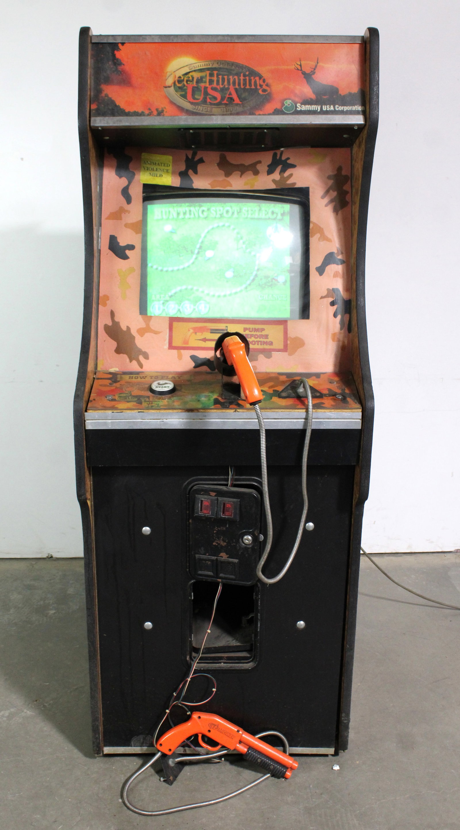 Sammy Deer Hunting USA Arcade Game: Working game but gun is not registering. Includes an extra gun. This item requires third-party shipping or pickup arrangements to be made. Dimensions: 71 x 26 x 33