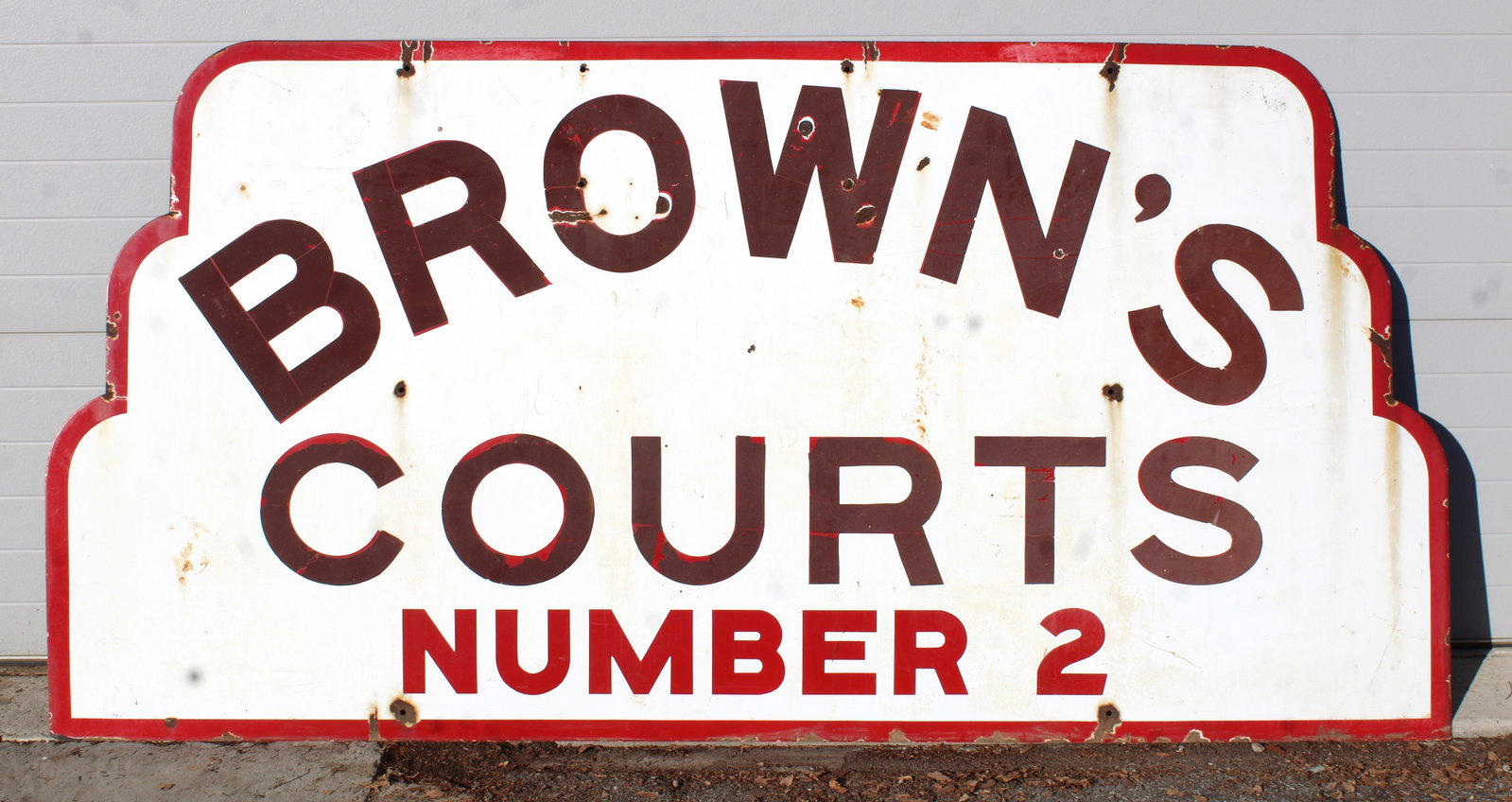 Brown’s Courts Art Deco Porcelain Sign (8 FT): This item requires third-party shipping or pickup arrangements to be made. Dimensions: 48 x 96