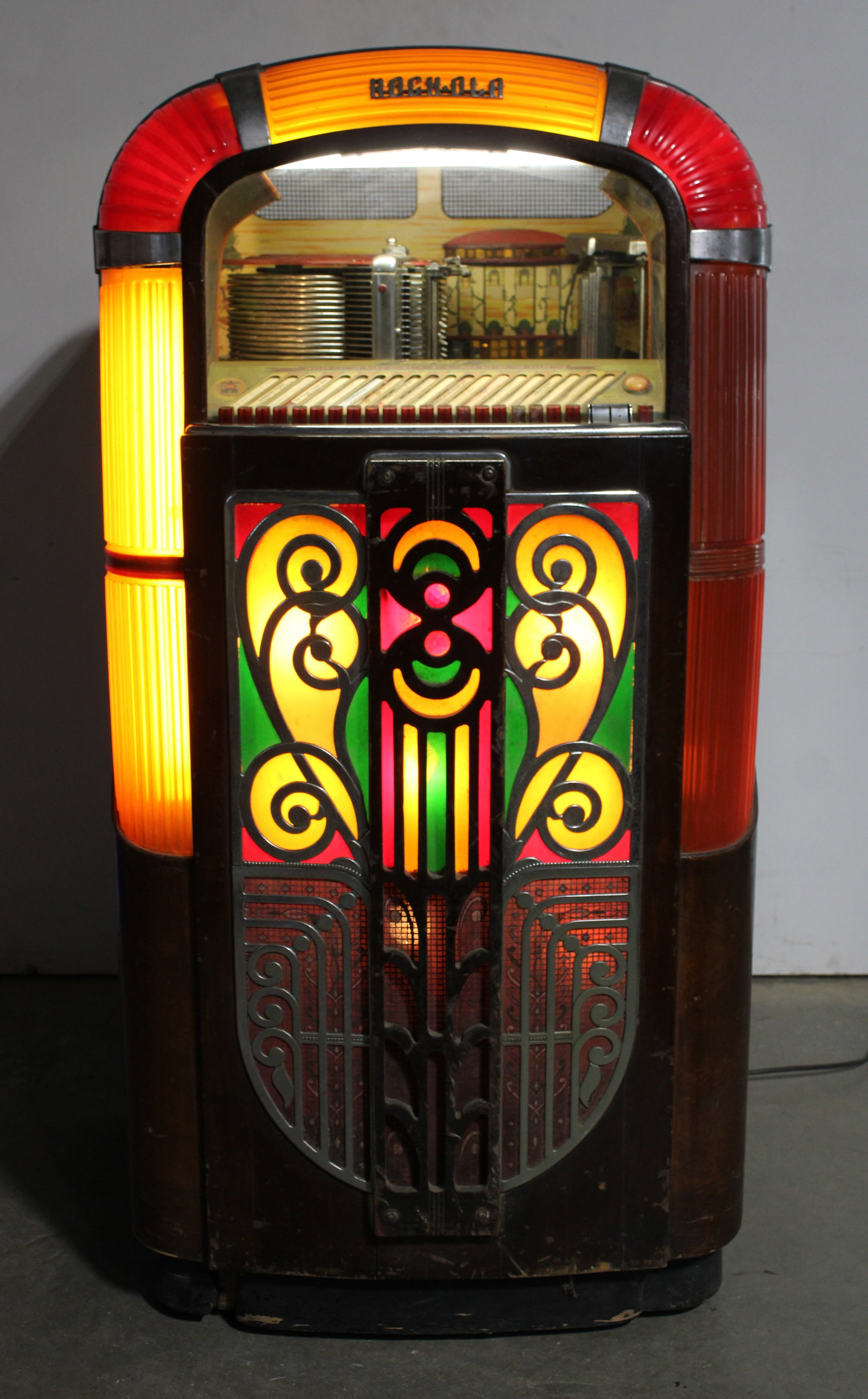 Rockola 1422 Coin Operated Jukebox: Working but should be gone through as it has been sitting for many years. This item requires third-party shipping or pickup arrangements to be made. Dimensions: 58 x 30 x 26