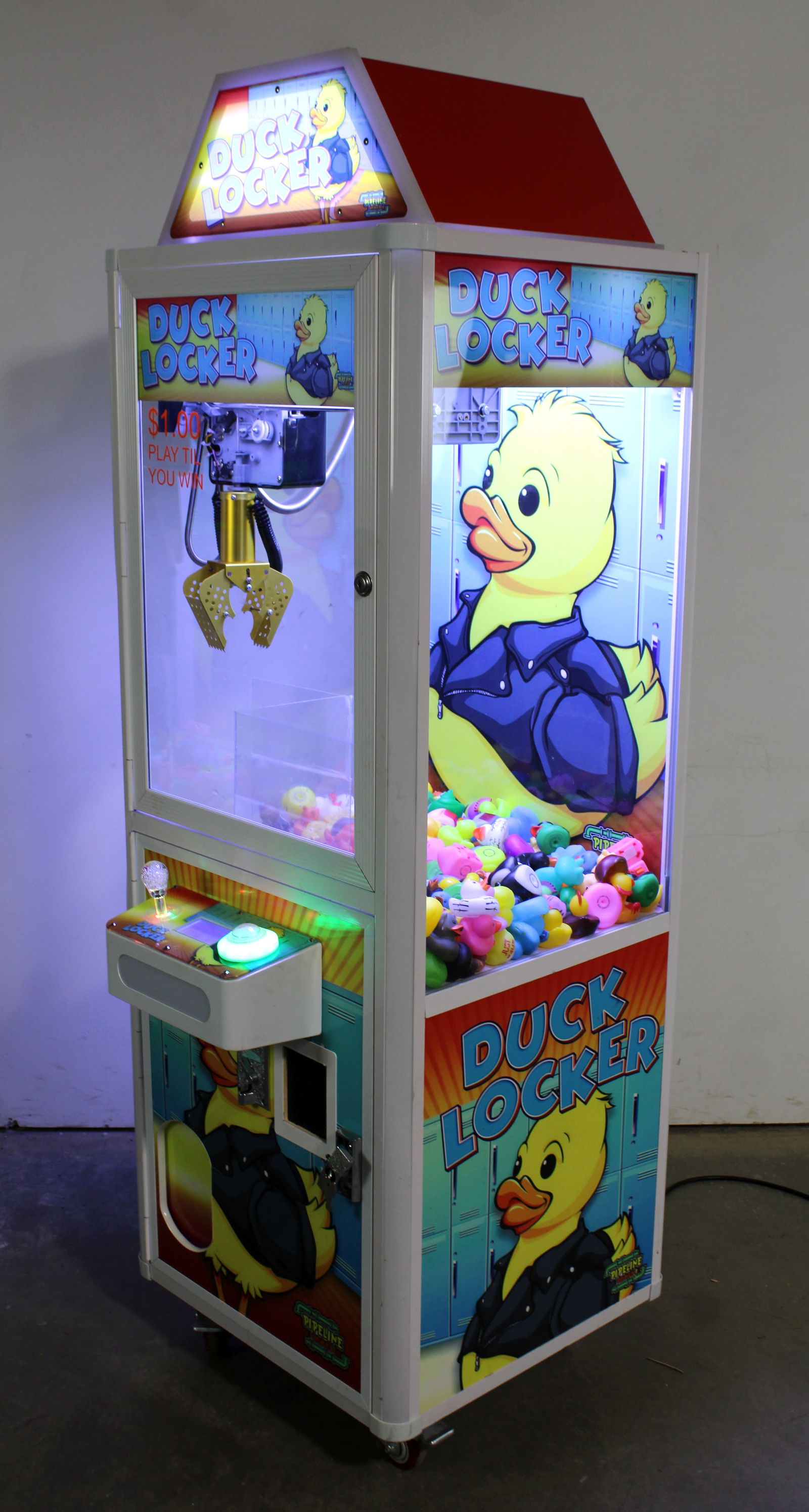 Duck Locker Crane Arcade Game, Lot 1: Working. This item requires third-party shipping or pickup arrangements to be made. Dimensions: 71 x 23 x 28
