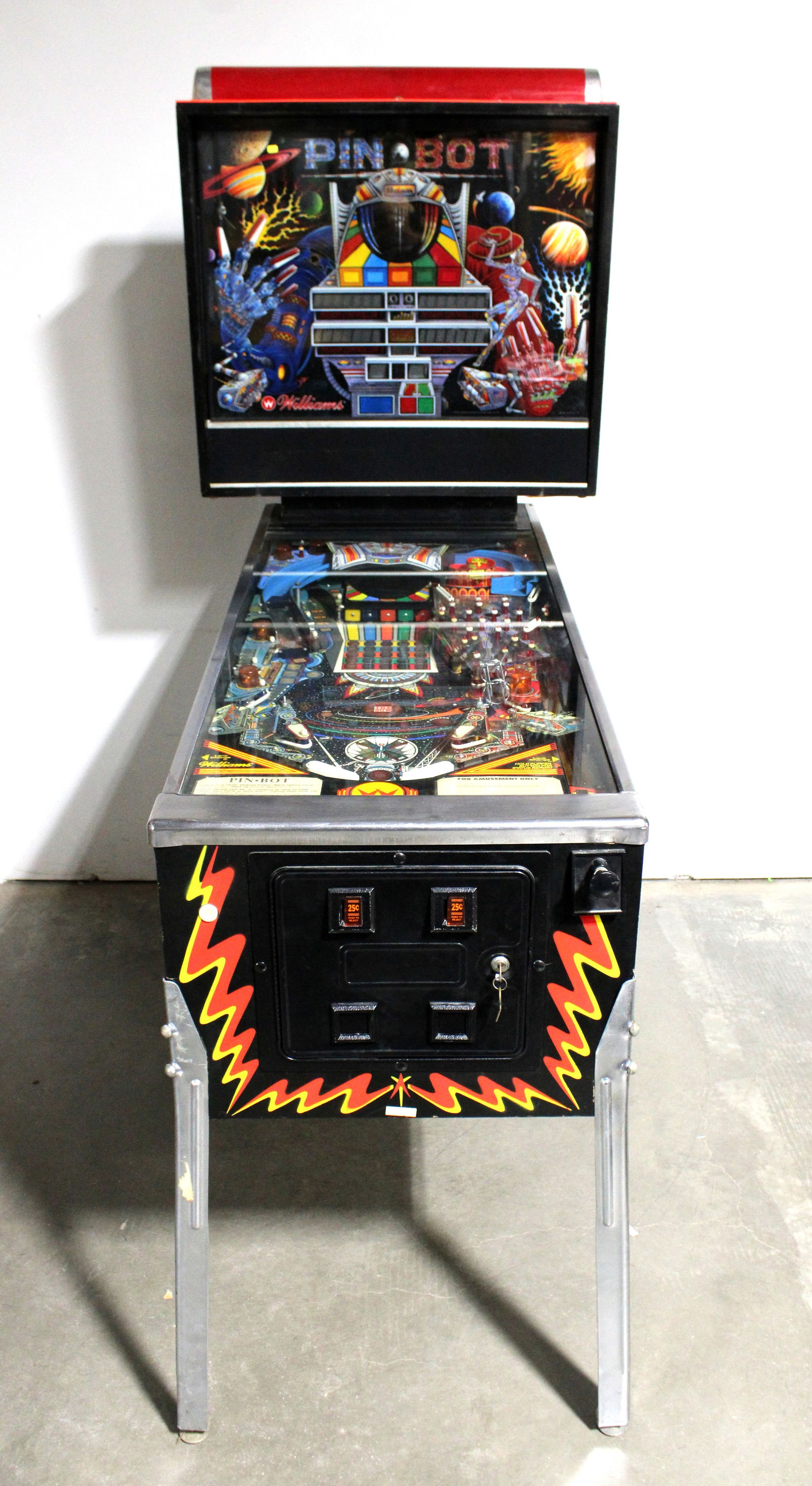 Williams Pin-Bot Pinball Machine: Complete, not working. This item requires third-party shipping or pickup arrangements to be made. Dimensions: 77 x 31 x 54