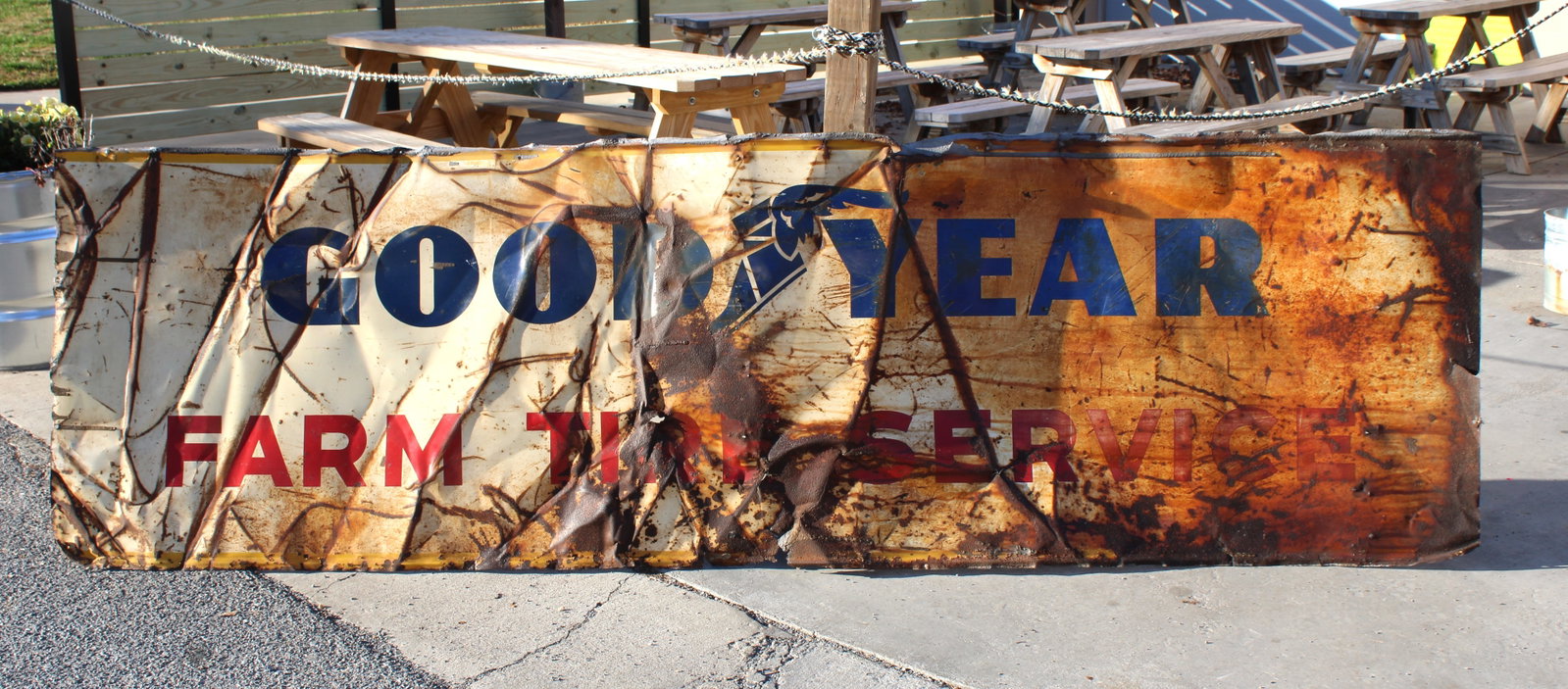 Goodyear Farm Tire Service Tin Sign (10 FT): This item requires third-party shipping or pickup arrangements to be made. Dimensions: 36 x 120 x 1