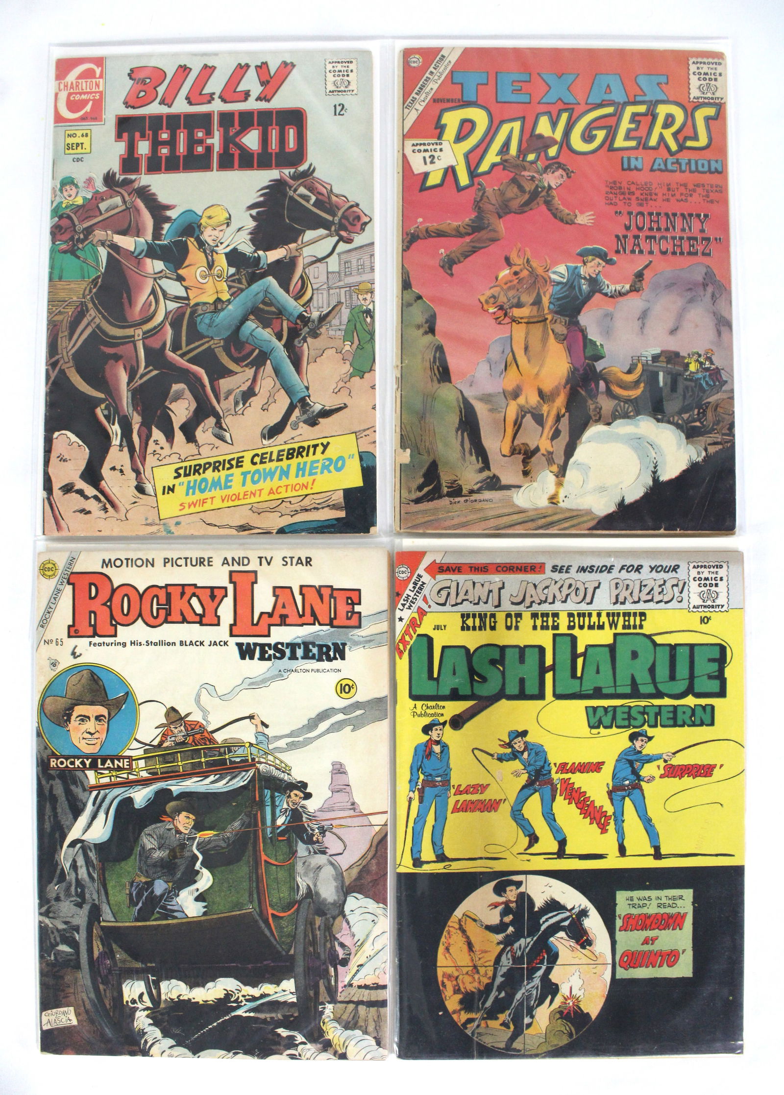 CDC Western Comic Lot incl. Lash LaRue and Rocky Lane: Total of 4 Issues. Assorted issues. Bagged and Boarded. Varying conditions. In-house shipping available.