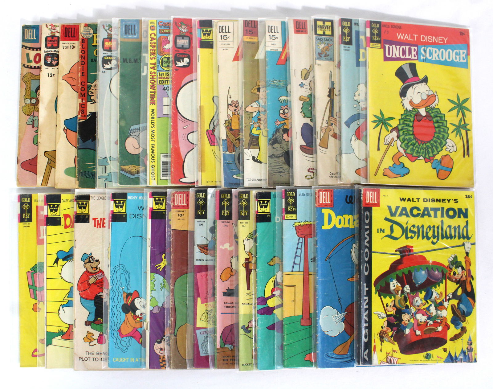 Children's Comics Mix Lot incl. Walt Disney: Total of 29 Issues. Assorted issues. Bagged and Boarded. Varying conditions. In-house shipping available.