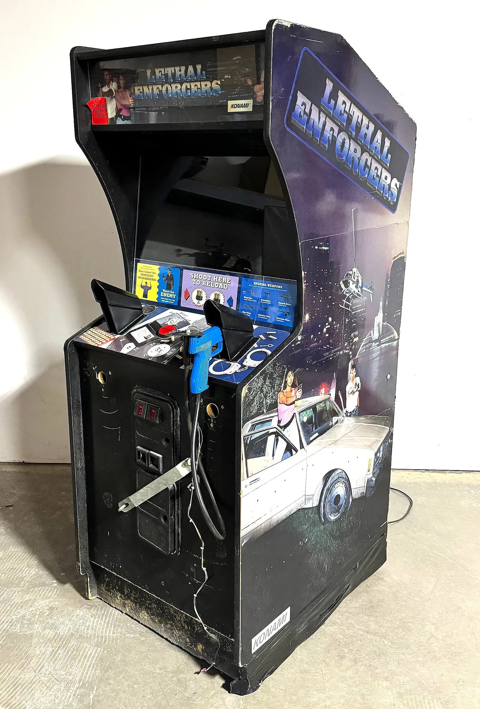 Konami Lethal Enforcers Arcade Game: No monitor. Board believed to be working. This item requires third-party shipping or pickup arrangements to be made. Dimensions: 73 x 30 x 36