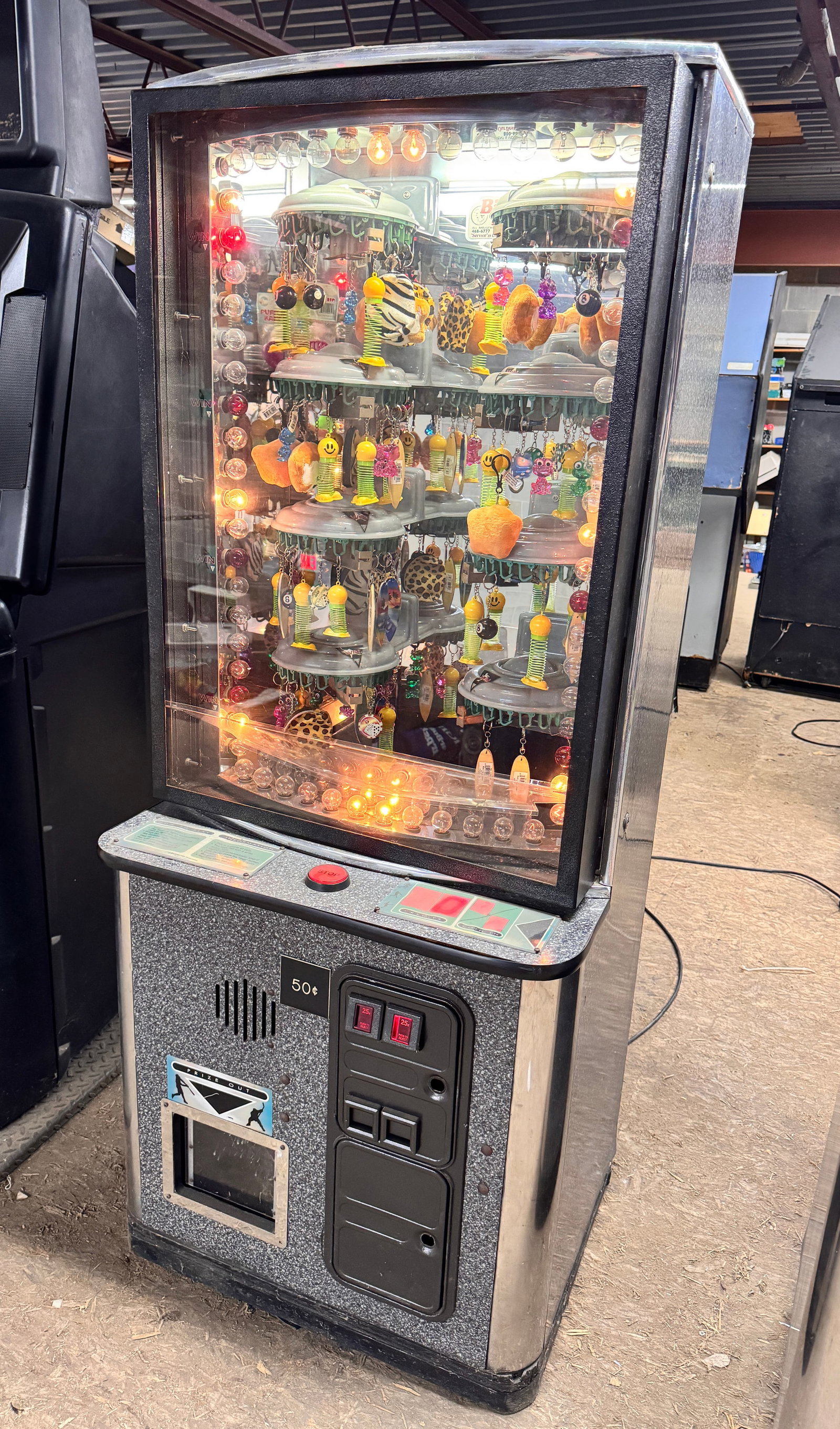 Sammy Sports Arena Prize Arcade Game: Working. Prizes not included. Dimensions: 68 x 29 x 29 ***This is a remote auction in Sewell, New Jersey. Pickup or third-party shipping is required on this item. A list of suggested shippers can be f