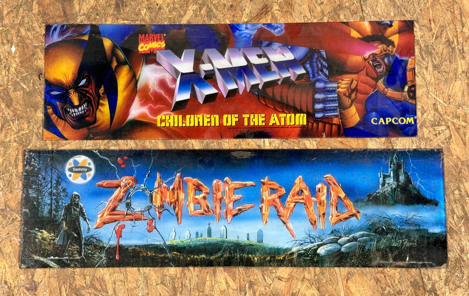 Arcade Headers incl. Zombie Raid and X-Men Children of the Atom: Untested. **In-house shipping available. Please reach out to auction house prior to pickup day if you are needing this item shipped.