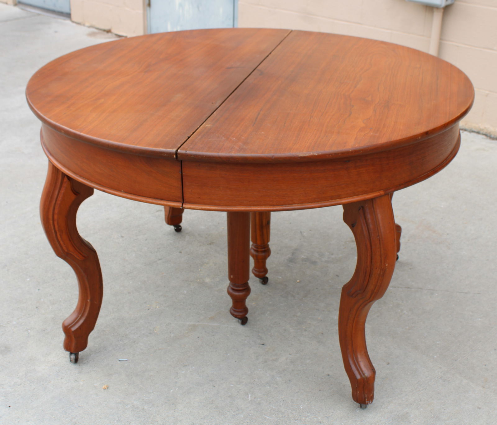 Walnut Victorian Dining Table with Cabriole Legs, 1870s: This item requires third-party shipping or pickup arrangements to be made. Dimensions: 30 x 47 x 47