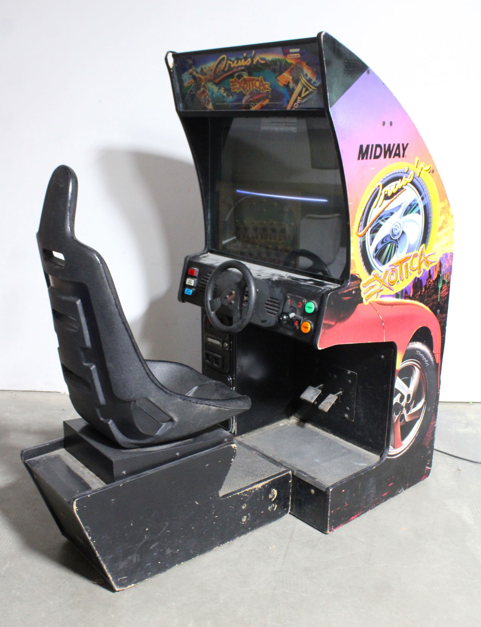 Midway Cruis'n World Sit Down Racing Arcade Game: Includes a Cruis'n World and Exotica board. Exotica board has damage. Not working. This item requires third-party shipping or pickup arrangements to be made. Dimensions: 68 x 31 x 61