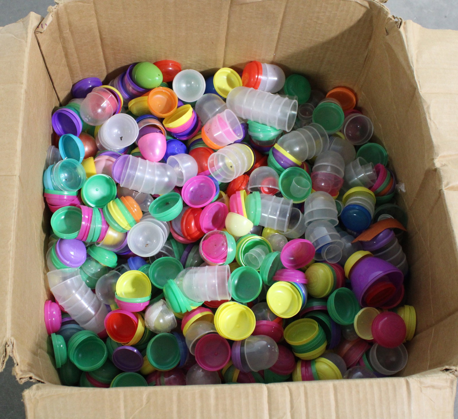 Large Lot of 2" Vending Capsules: Box size is 16 x 20 x 20 and is approximately half full. In-house shipping available.
