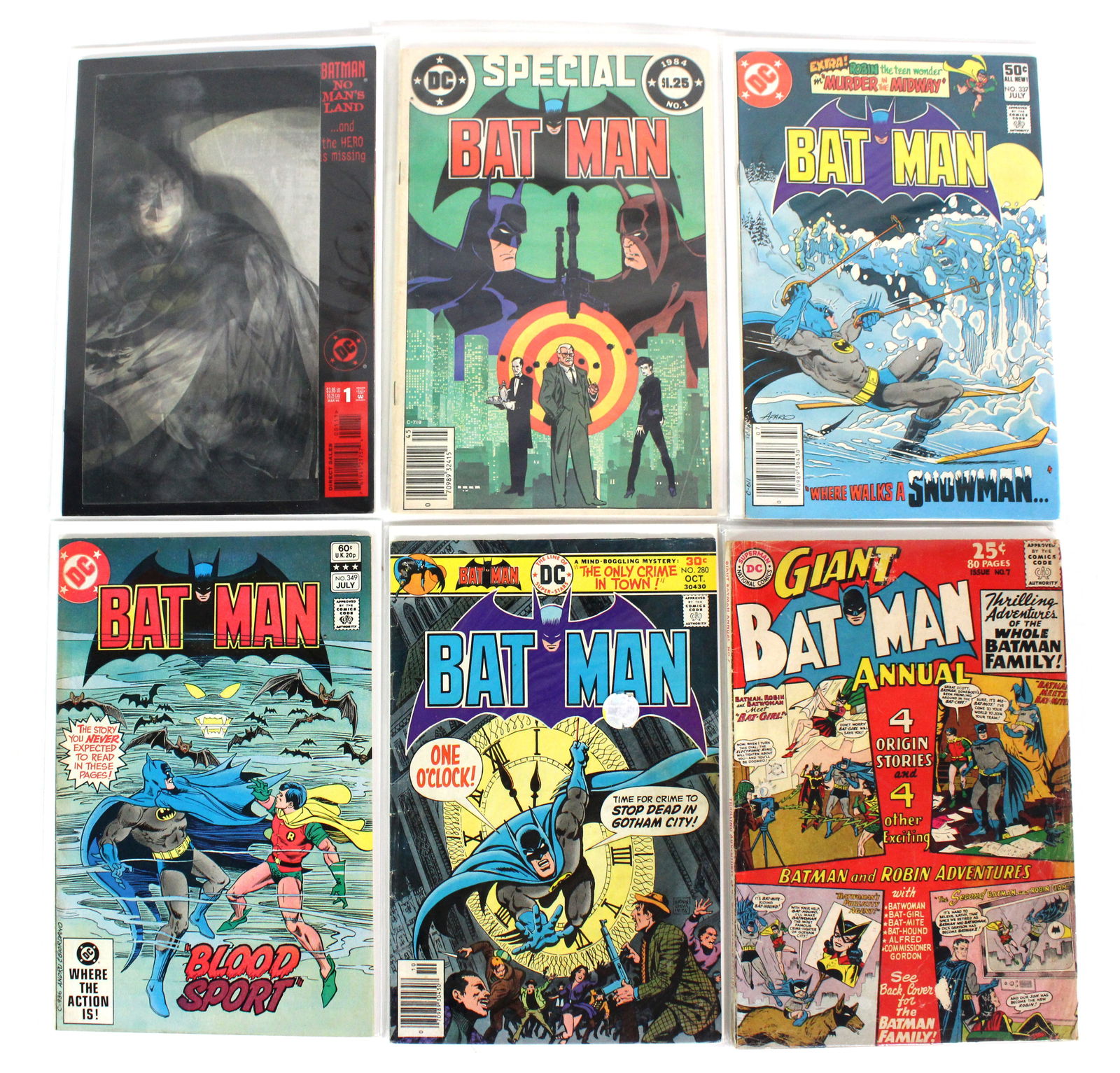 DC Comics Batman Comic Books Including Giant Annual #7: Total of 6 Issues. Assorted issues. Bagged and Boarded. Varying conditions. In-house shipping available.
