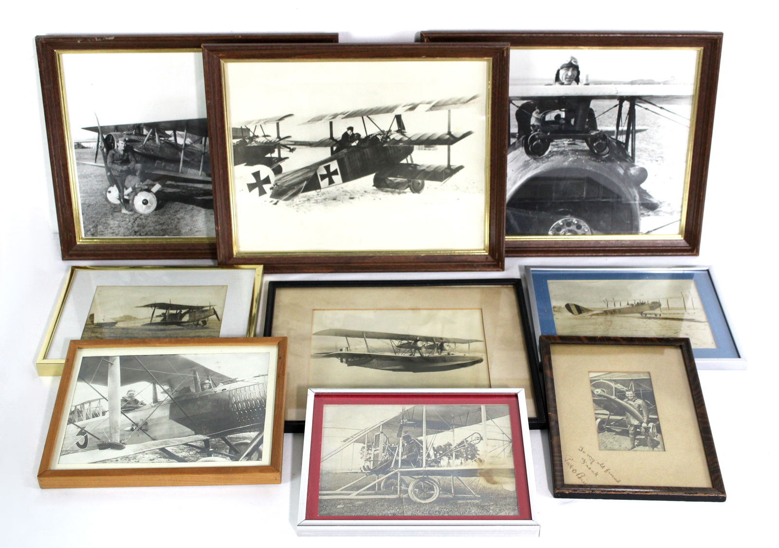 Early Aviation Photos, Framed Lot 1: Total of 9. This item requires third-party shipping or pickup arrangements to be made.