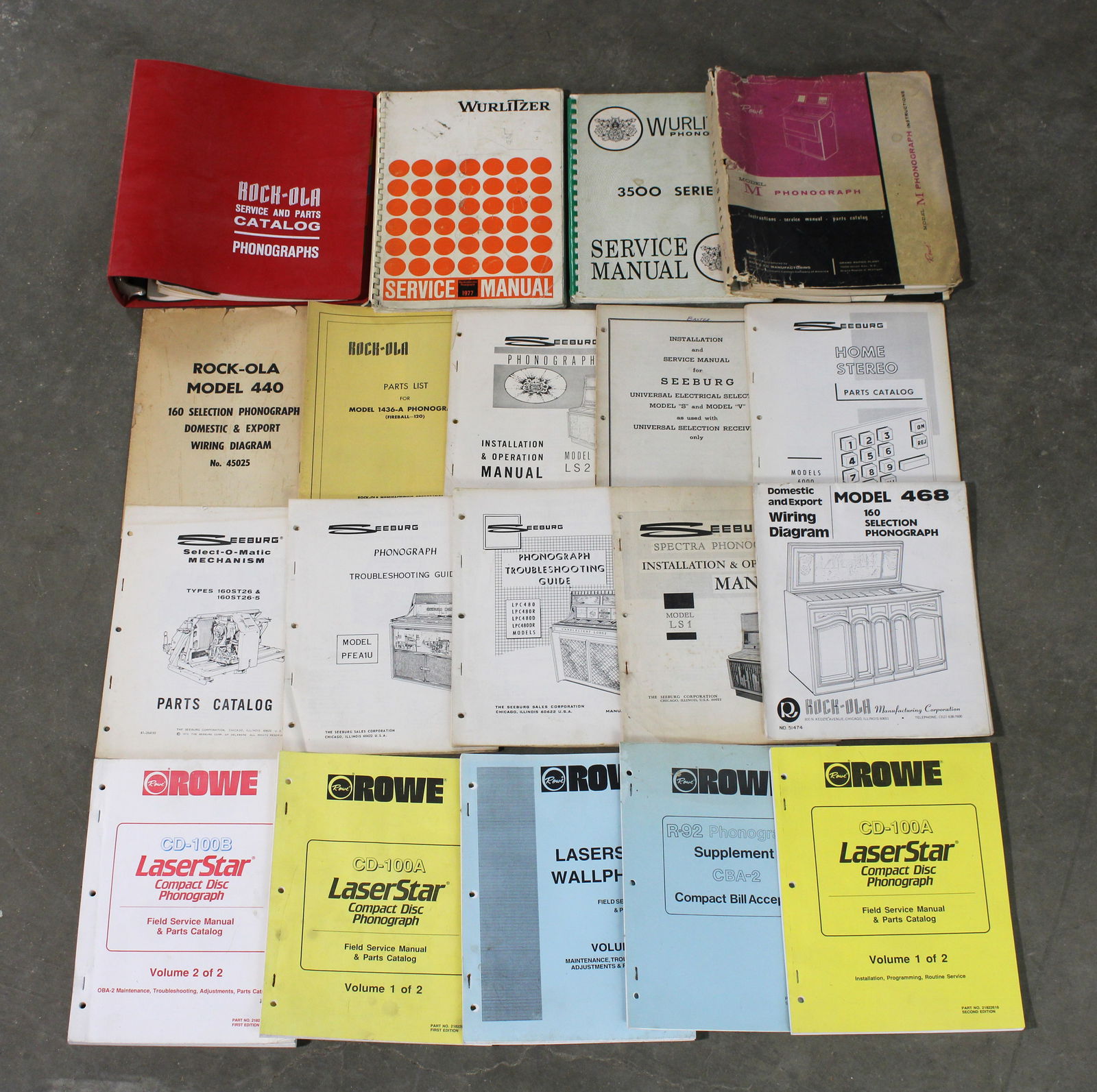Jukebox Manuals incl. Seeburg and Rockola: Red Binder is empty. 18 manuals plus binder. In-house shipping available.