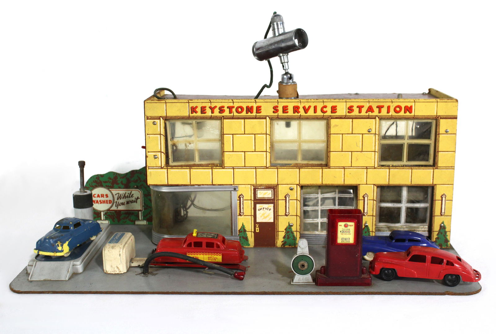 Keystone Masonite Service Station Toy, 1940s: This item requires third-party shipping or pickup arrangements to be made. Dimensions: 12 x 22 x 12