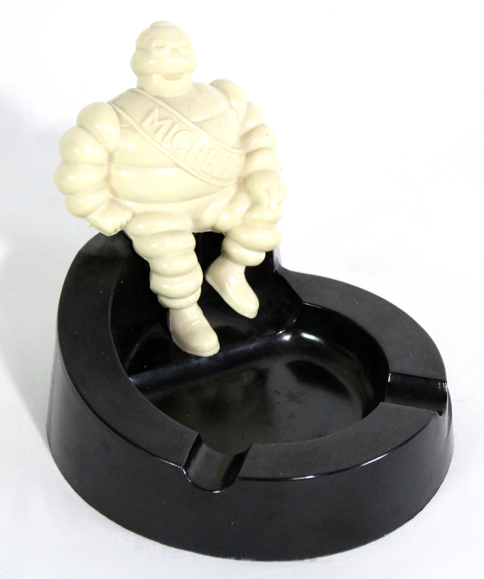 Bakelite Michelin Man Ashtray: In-house shipping available. Dimensions: 5 x 6 x 6