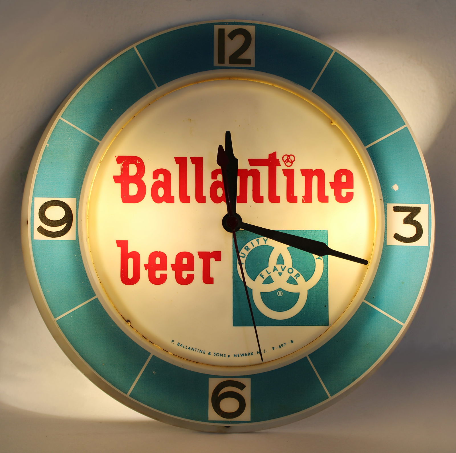 Ballantine Beer Light Up Clock: Light and clock are working. In-house shipping available. Dimensions: 12 x 12 x 4