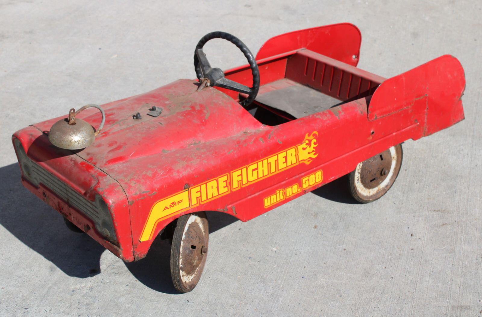 Fire Engine Kiddie Pedal Car: This item requires third-party shipping or pickup arrangements to be made. Dimensions: 19 x 16 x 42