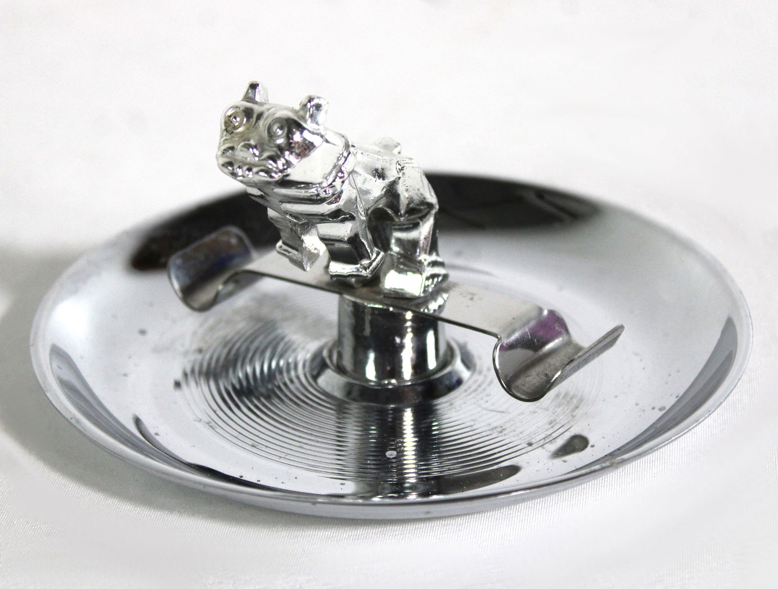 Chrome Mack Cigarette Ashtray: In-house shipping available. Dimensions: 3 x 6 x 6