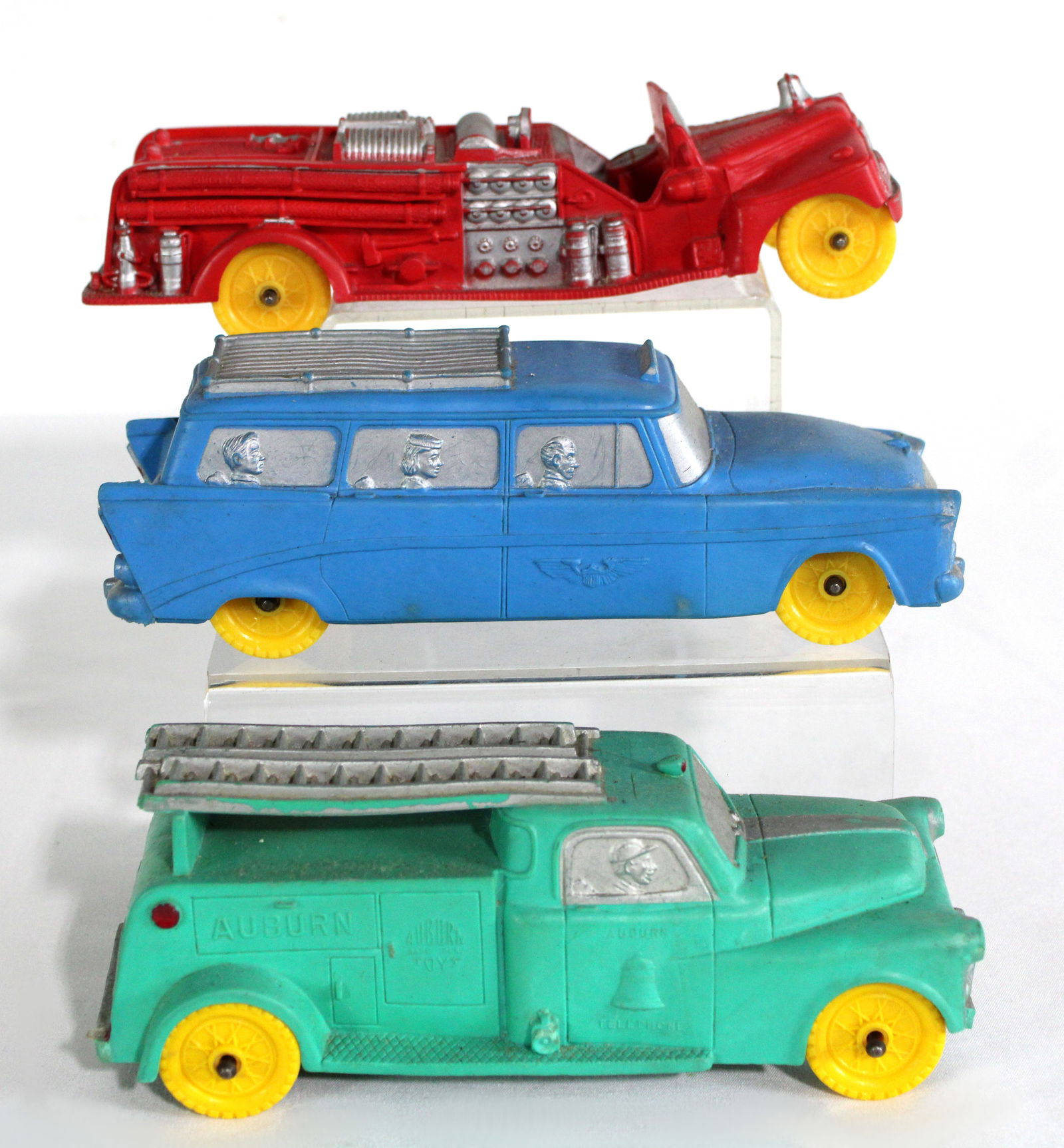 Auburn Rubber Taxi, Telephone Truck, and Fire Engine Toys: In-house shipping available.