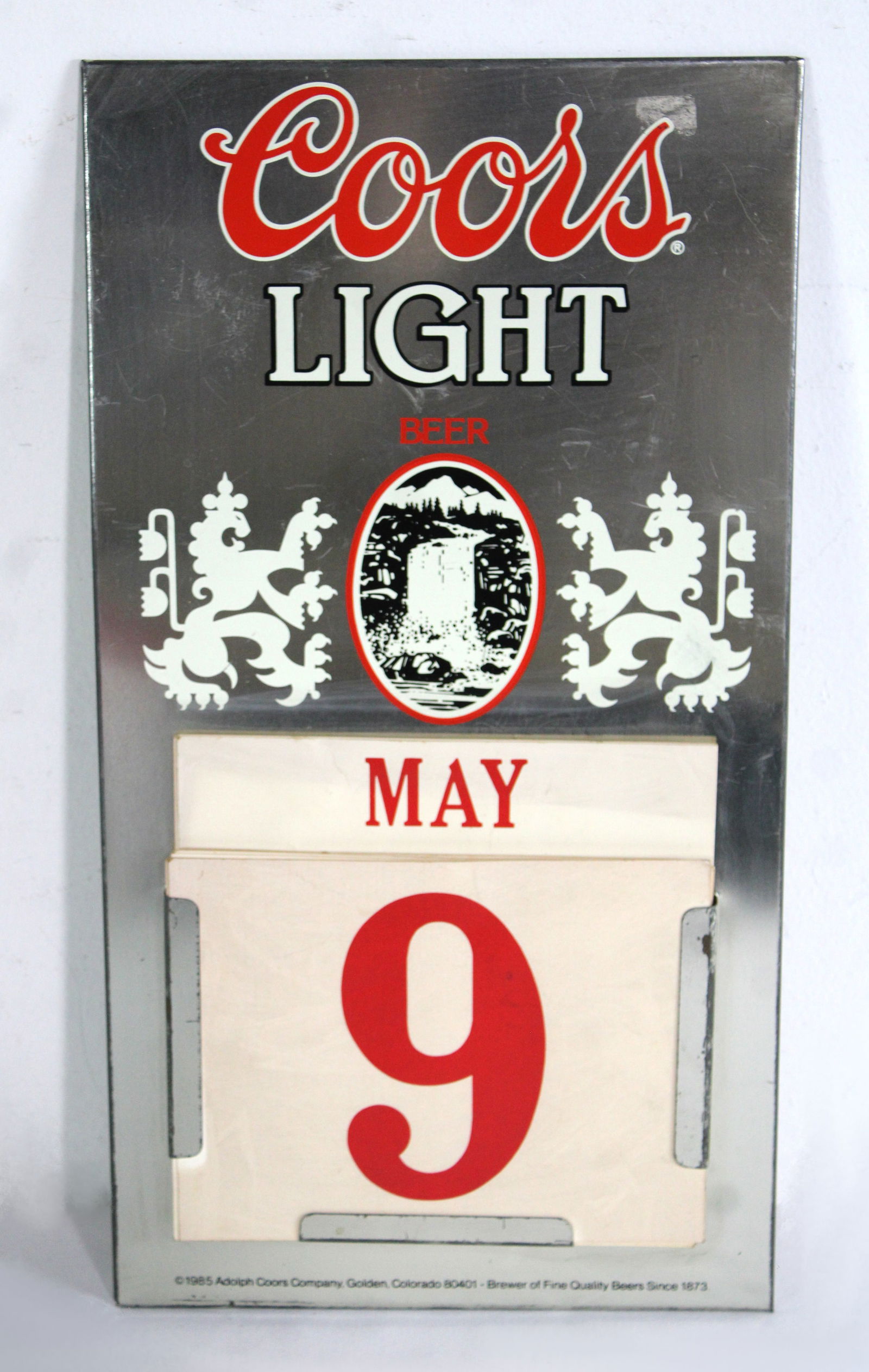 Coors Beer Calendar Sign, 1985: Dates not checked for completeness, Three months. Dates not checked for completeness, Three months. Dimensions: 17 x 9 x 1