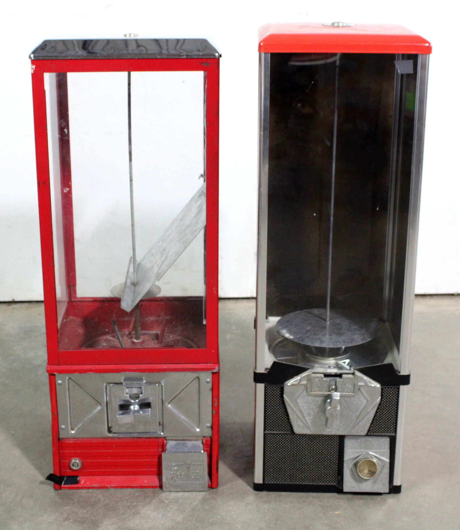 Pair of Large Gumballs or Capsule Vendors: This item requires third-party shipping or pickup arrangements to be made. Dimensions: 31 x 10 x 12