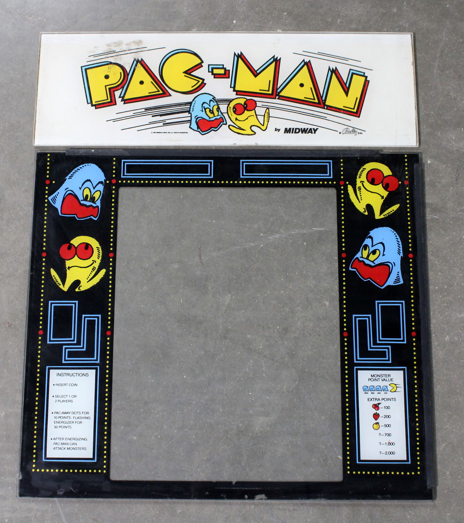Bally Pac-Man Mini Arcade Header and Bezel: Glass Marquee with plexi header. This item requires third-party shipping or pickup arrangements to be made.