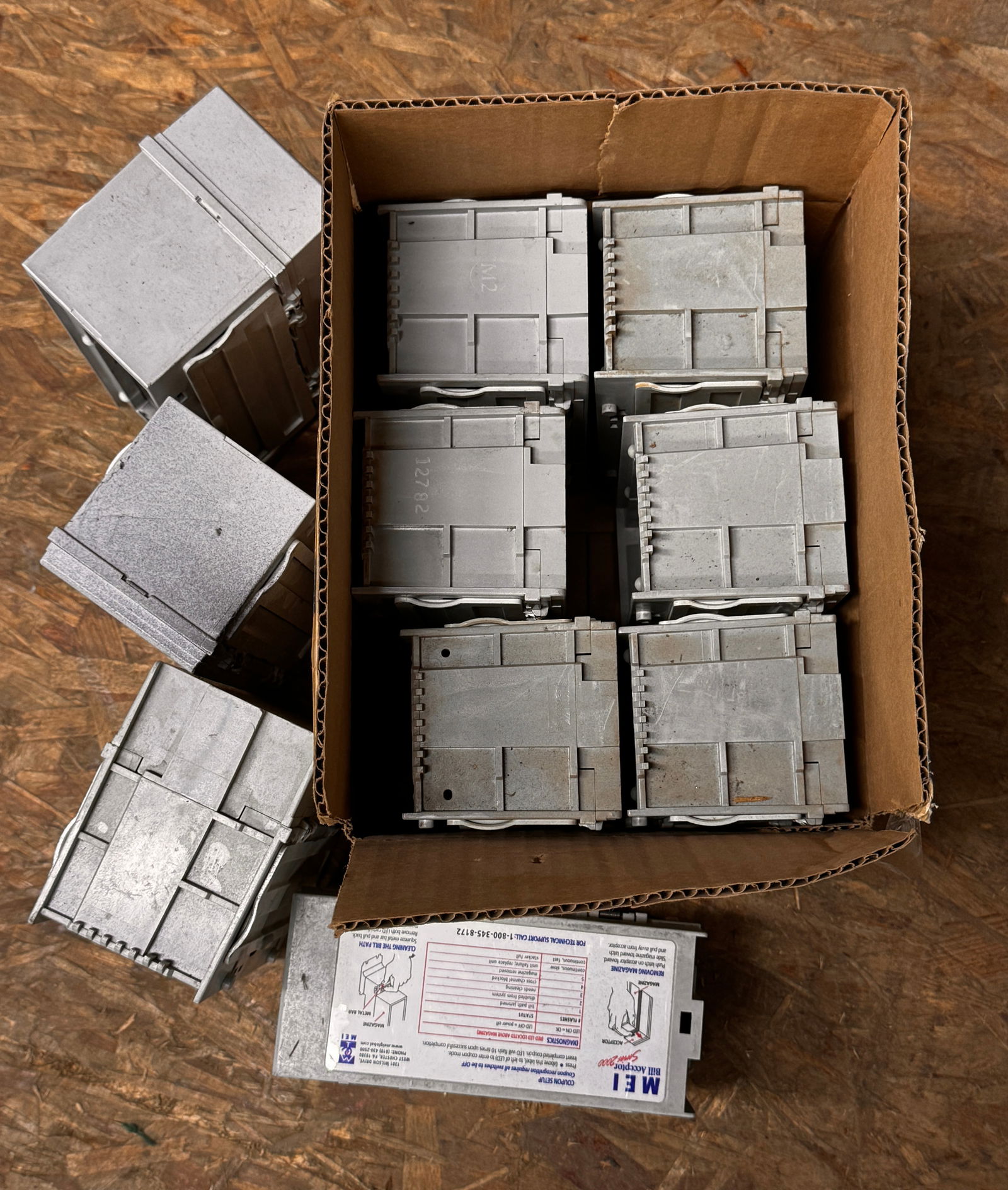 MEI Dollar Bill Acceptor Bill Stackers, Lot 1: Total of 10. ***This is a remote auction in Sewell, New Jersey. Pickup or third-party shipping is required on this item. A list of suggested shippers can be found in the terms of this auction and on